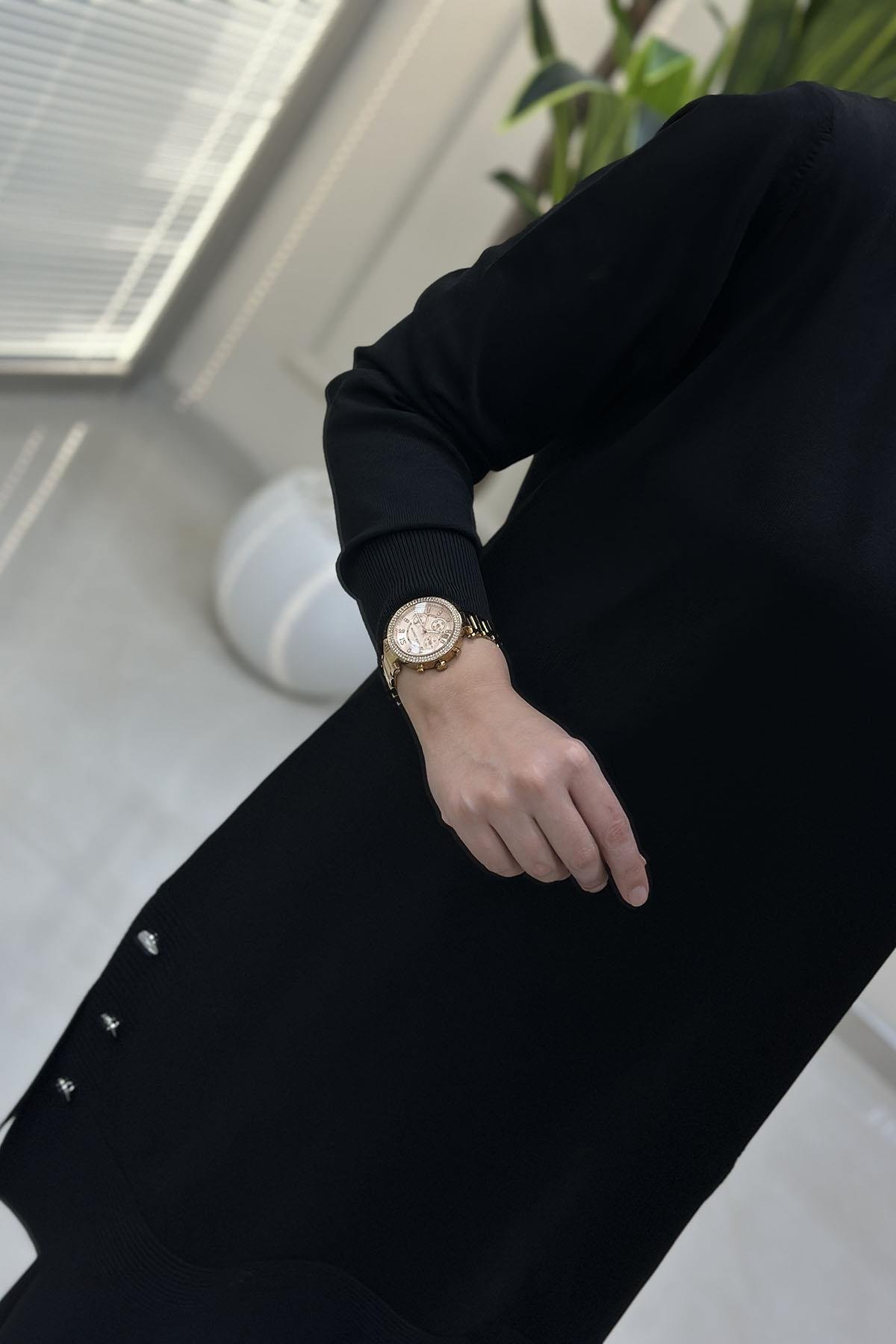 Tesettür Tunik ModelleriMerserize Yanları Düğme Detaylı Kadın Triko Tunik Siyah KADO 2725007