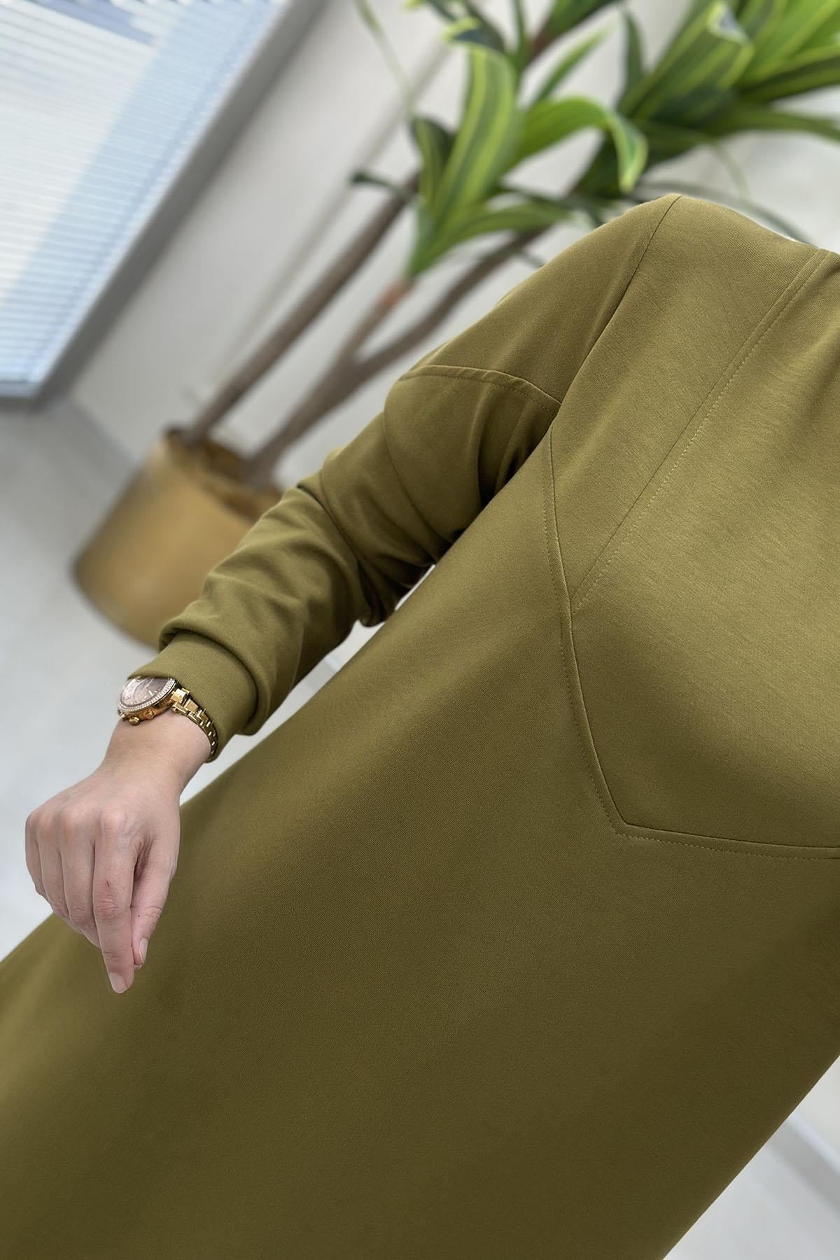 Tesettür Tunik ModelleriÖn ve Kol Dikiş Detaylı Oysho Kadın Tunik Yağ Yeşili KADO 257320