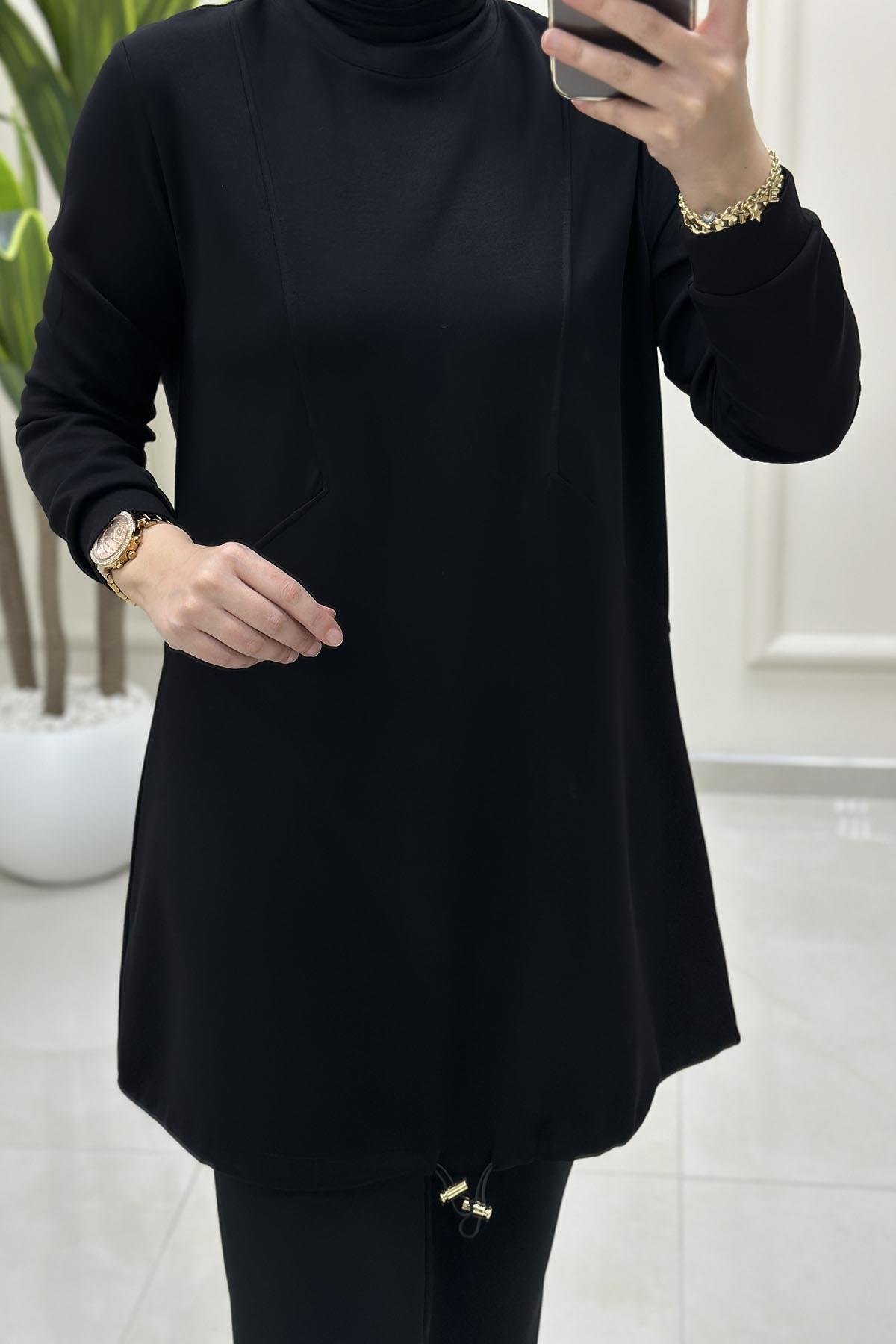 Tesettür Tunik ModelleriÖnü Dikiş Modelli Eteği Büzgülü Kadın Oysho Tunik Siyah KADO 257318