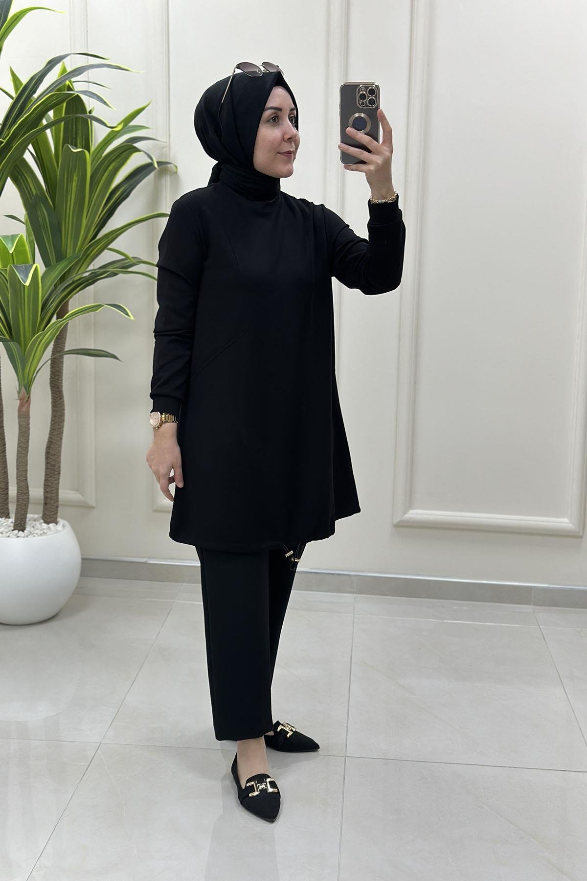 Tesettür Tunik ModelleriÖnü Dikiş Modelli Eteği Büzgülü Kadın Oysho Tunik Siyah KADO 257318