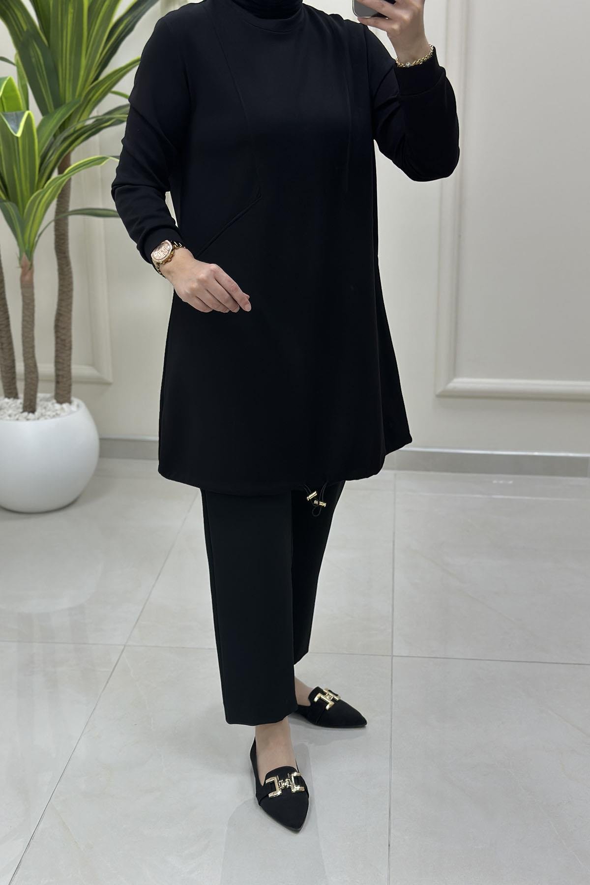 Tesettür Tunik ModelleriÖnü Dikiş Modelli Eteği Büzgülü Kadın Oysho Tunik Siyah KADO 257318