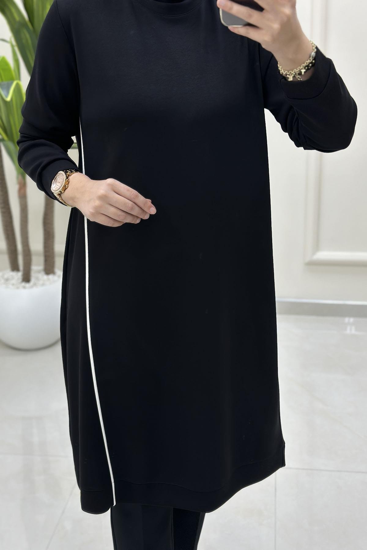 Tesettür Tunik ModelleriÖnü Şeritli Yan Fermuar Detaylı Kadın Tunik Siyah KADO 257536