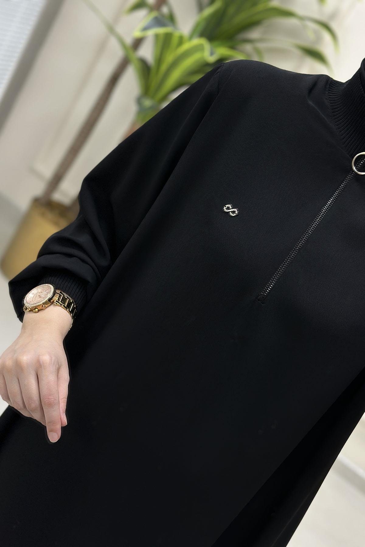 Tesettür Tunik ModelleriÖnü Yarım Fermuarlı Ribana Detaylı Kadın Tunik Siyah KADO 251491