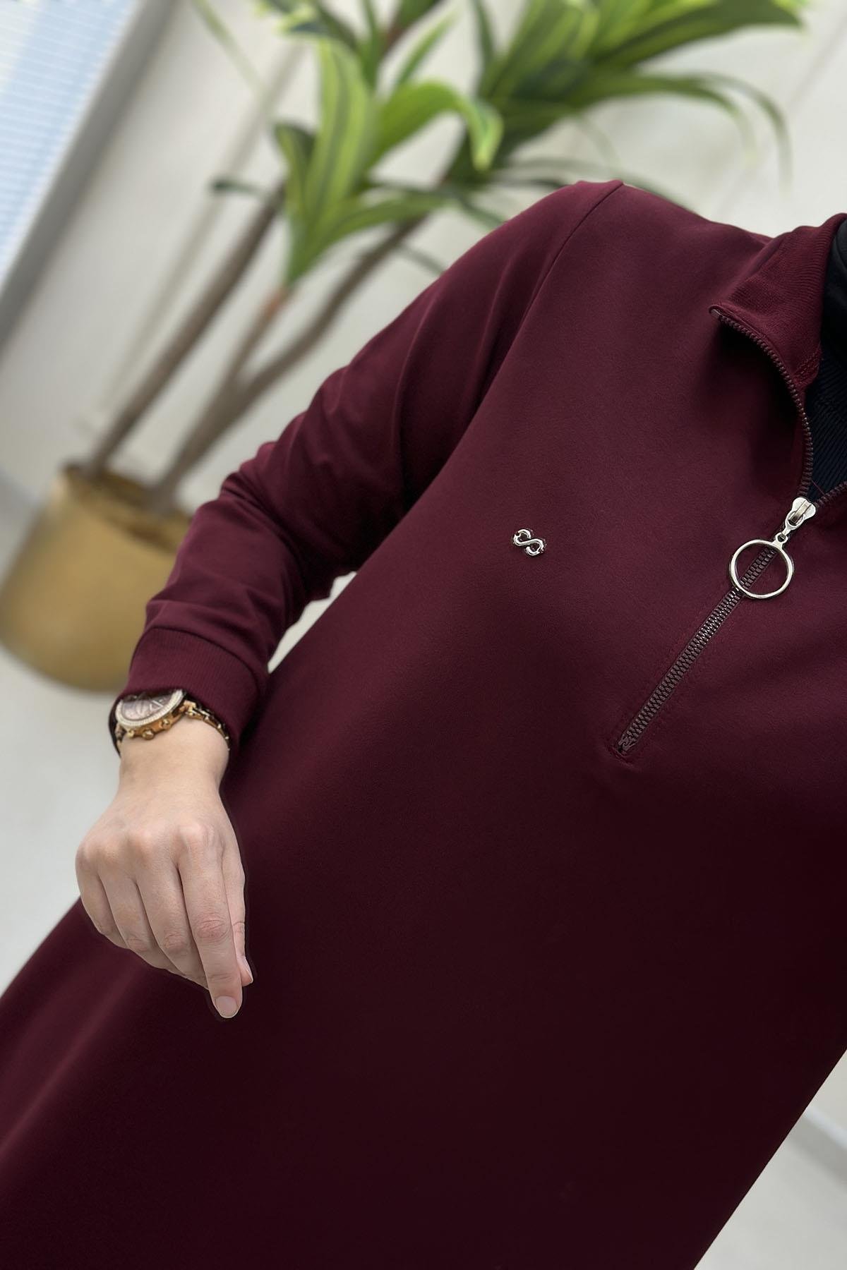 Tesettür Tunik ModelleriÖnü Yarım Fermuarlı Ribana Detaylı Kadın Tunik Bordo KADO 257322