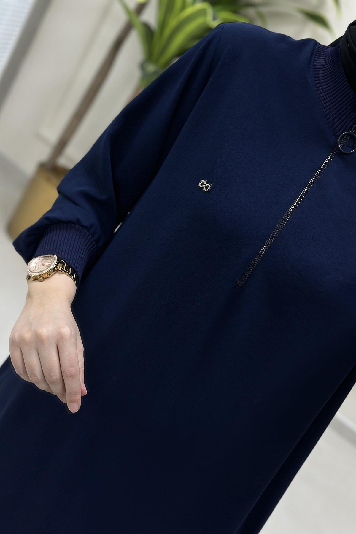Tesettür Tunik ModelleriÖnü Yarım Fermuarlı Ribana Detaylı Kadın Tunik Lacivert KADO 251491