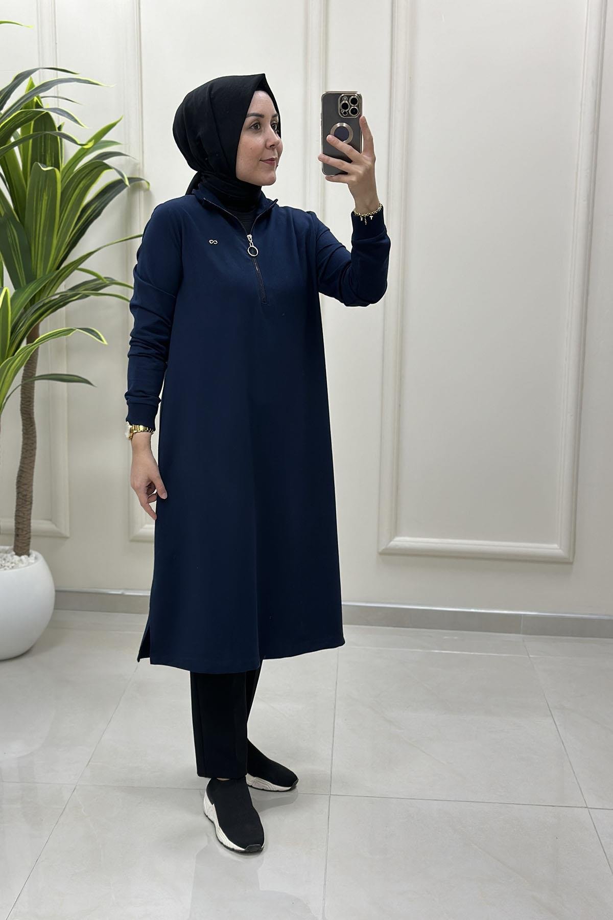 Tesettür Tunik ModelleriÖnü Yarım Fermuarlı Ribana Detaylı Kadın Tunik Lacivert KADO 257322