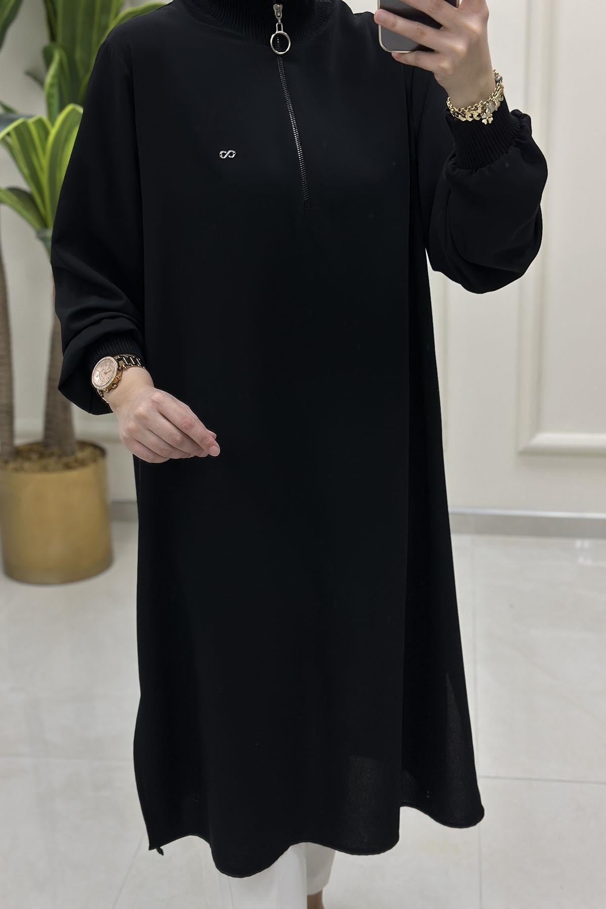 Tesettür Tunik ModelleriÖnü Yarım Fermuarlı Ribana Detaylı Kadın Tunik Siyah KADO 251491