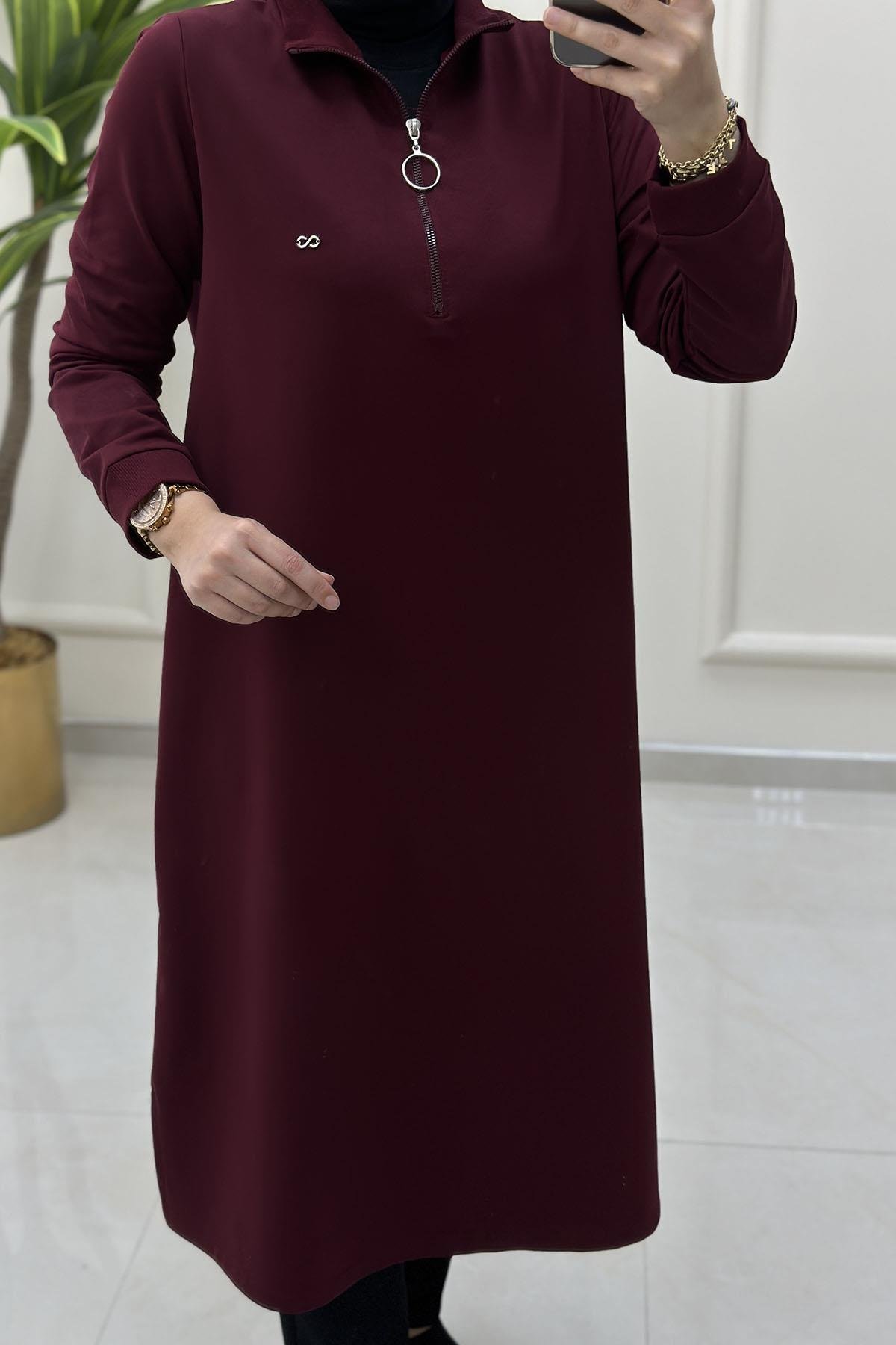 Tesettür Tunik ModelleriÖnü Yarım Fermuarlı Ribana Detaylı Kadın Tunik Bordo KADO 257322