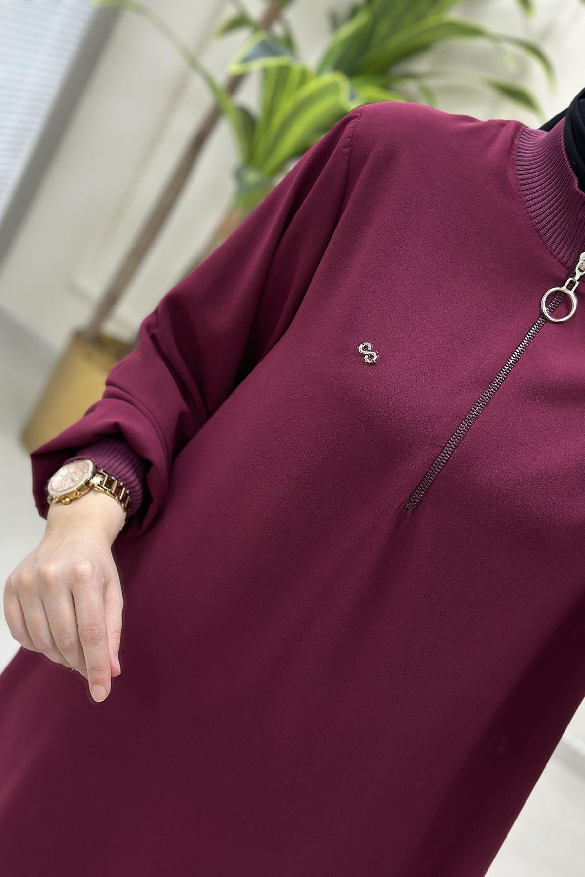 Tesettür Tunik ModelleriÖnü Yarım Fermuarlı Ribana Detaylı Kadın Tunik Açık Bordo KADO 251491