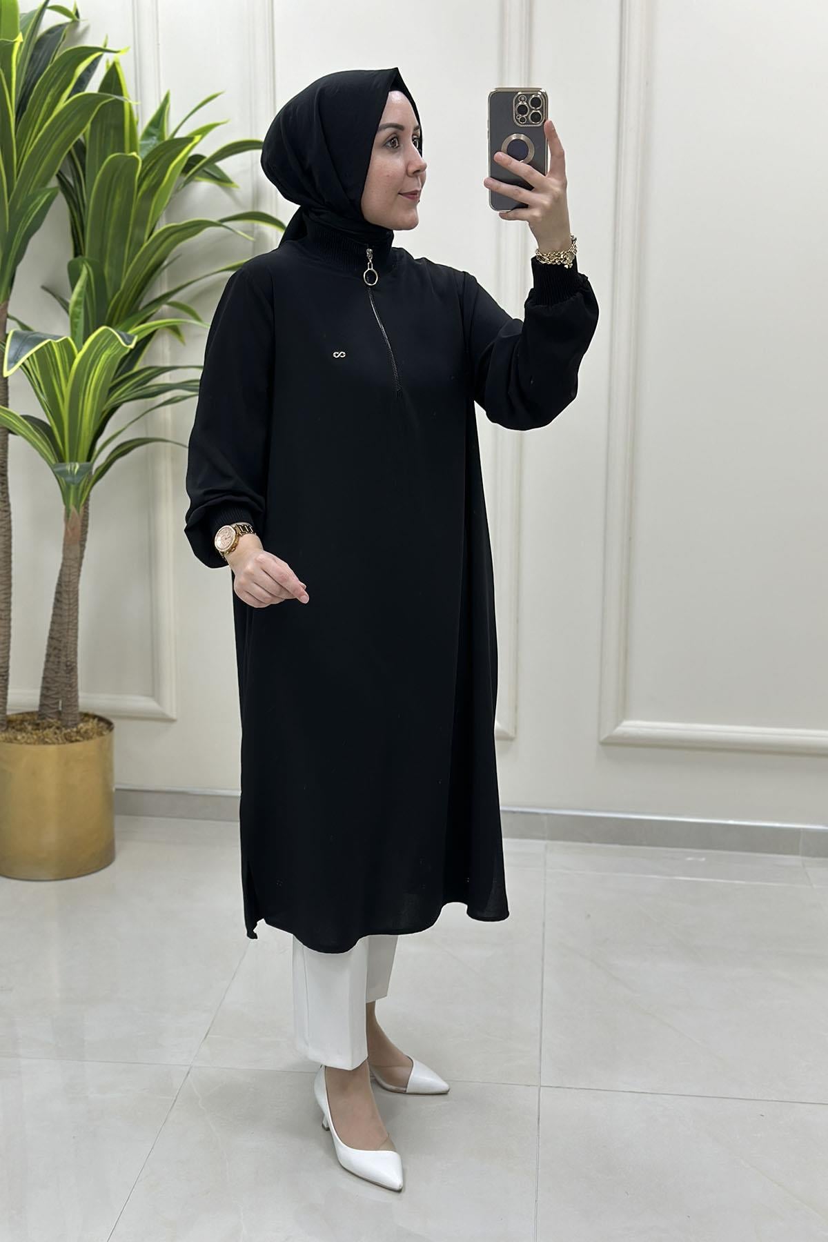 Tesettür Tunik ModelleriÖnü Yarım Fermuarlı Ribana Detaylı Kadın Tunik Siyah KADO 251491