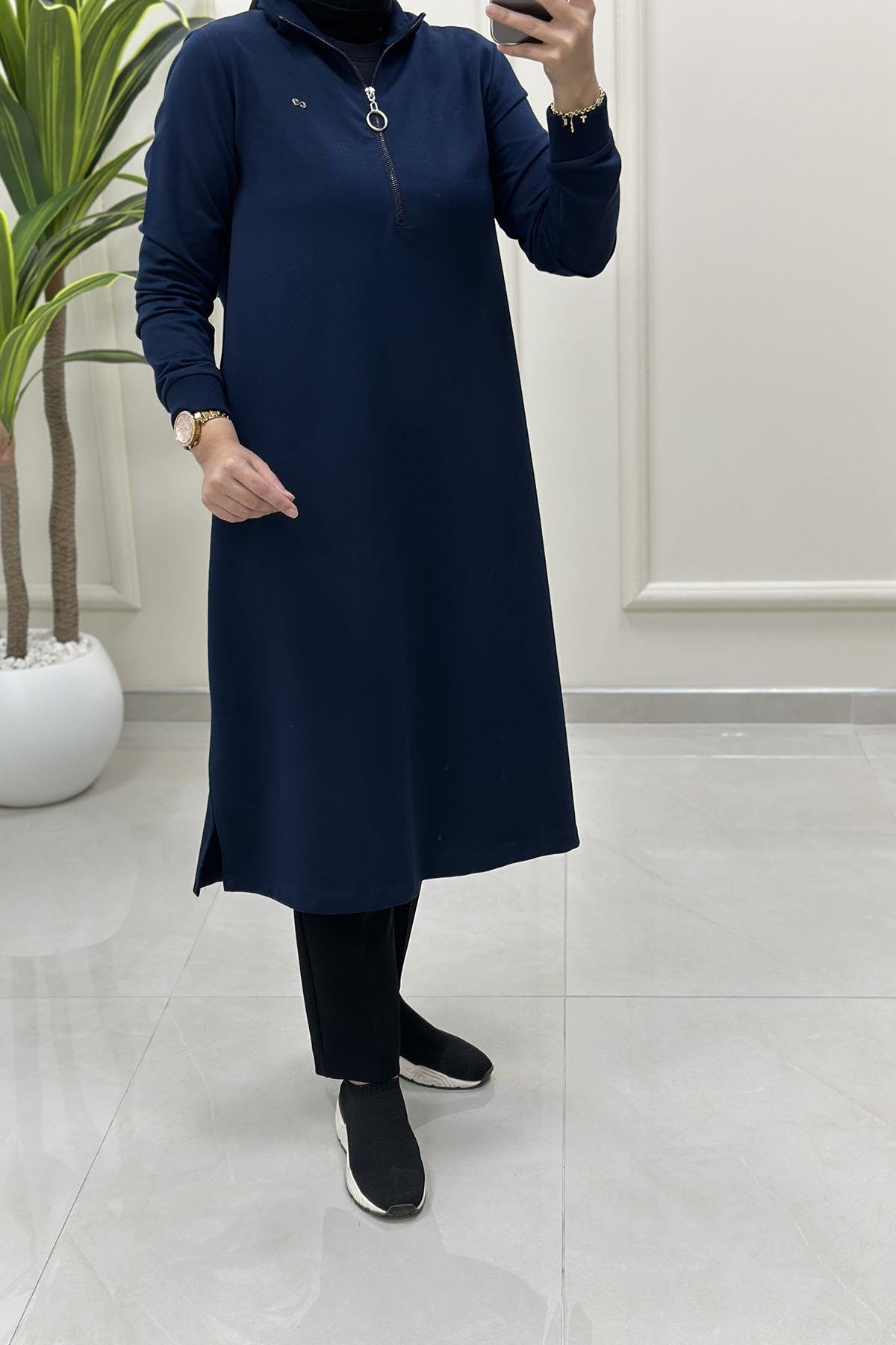 Tesettür Tunik ModelleriÖnü Yarım Fermuarlı Ribana Detaylı Kadın Tunik Lacivert KADO 257322