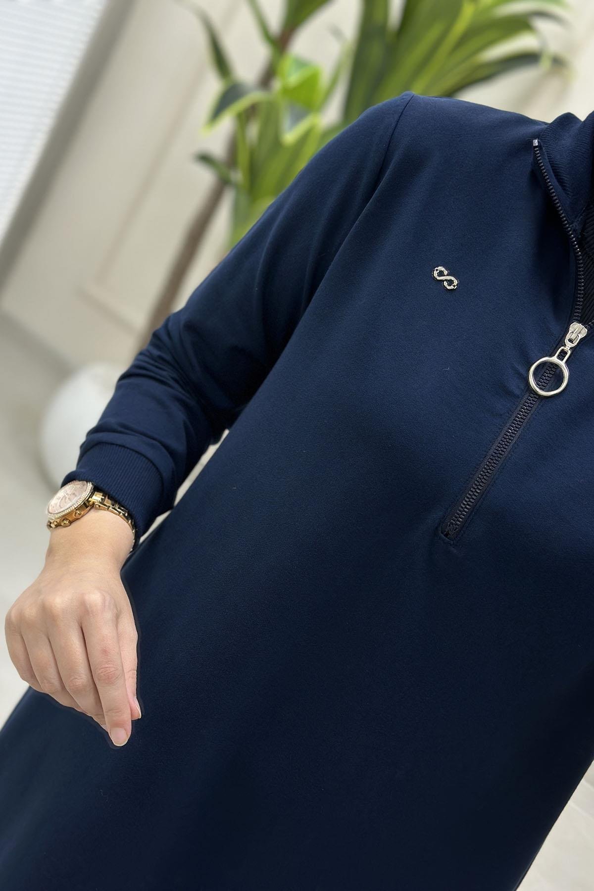Tesettür Tunik ModelleriÖnü Yarım Fermuarlı Ribana Detaylı Kadın Tunik Lacivert KADO 257322