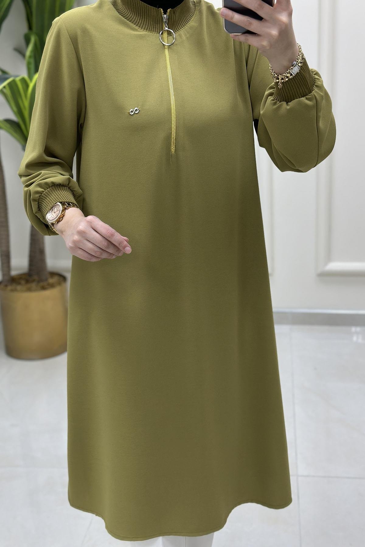 Tesettür Tunik ModelleriÖnü Yarım Fermuarlı Ribana Detaylı Kadın Tunik Yağ Yeşili KADO 251491