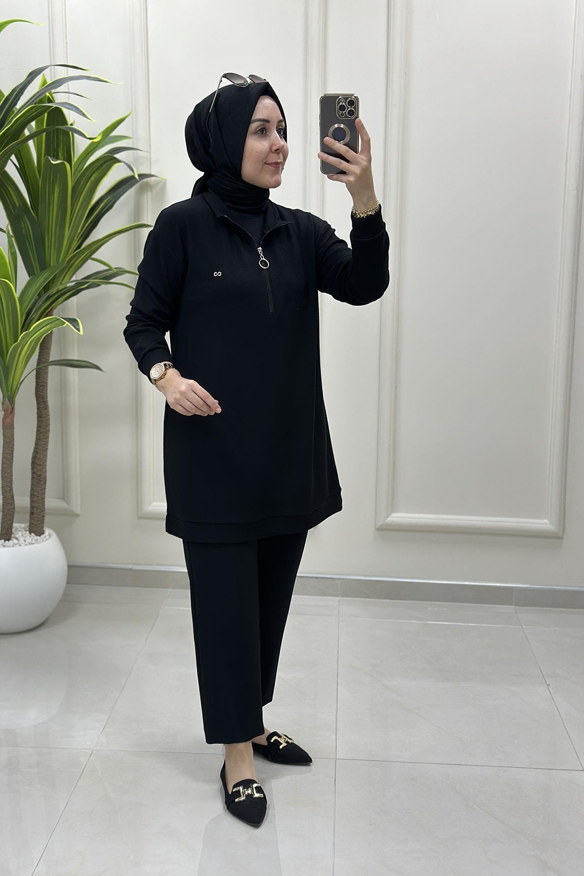 Tesettür Tunik ModelleriÖnü Yarım Fermuarlı Basic Örme Kadın Tunik Siyah KADO 257094