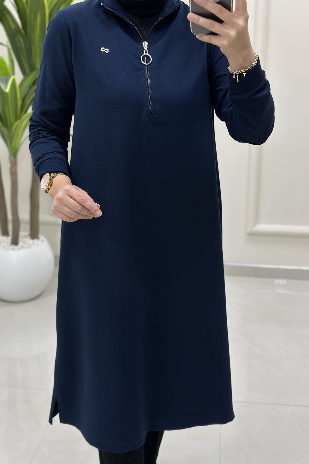 Tesettür Tunik ModelleriÖnü Yarım Fermuarlı Ribana Detaylı Kadın Tunik Lacivert KADO 257322