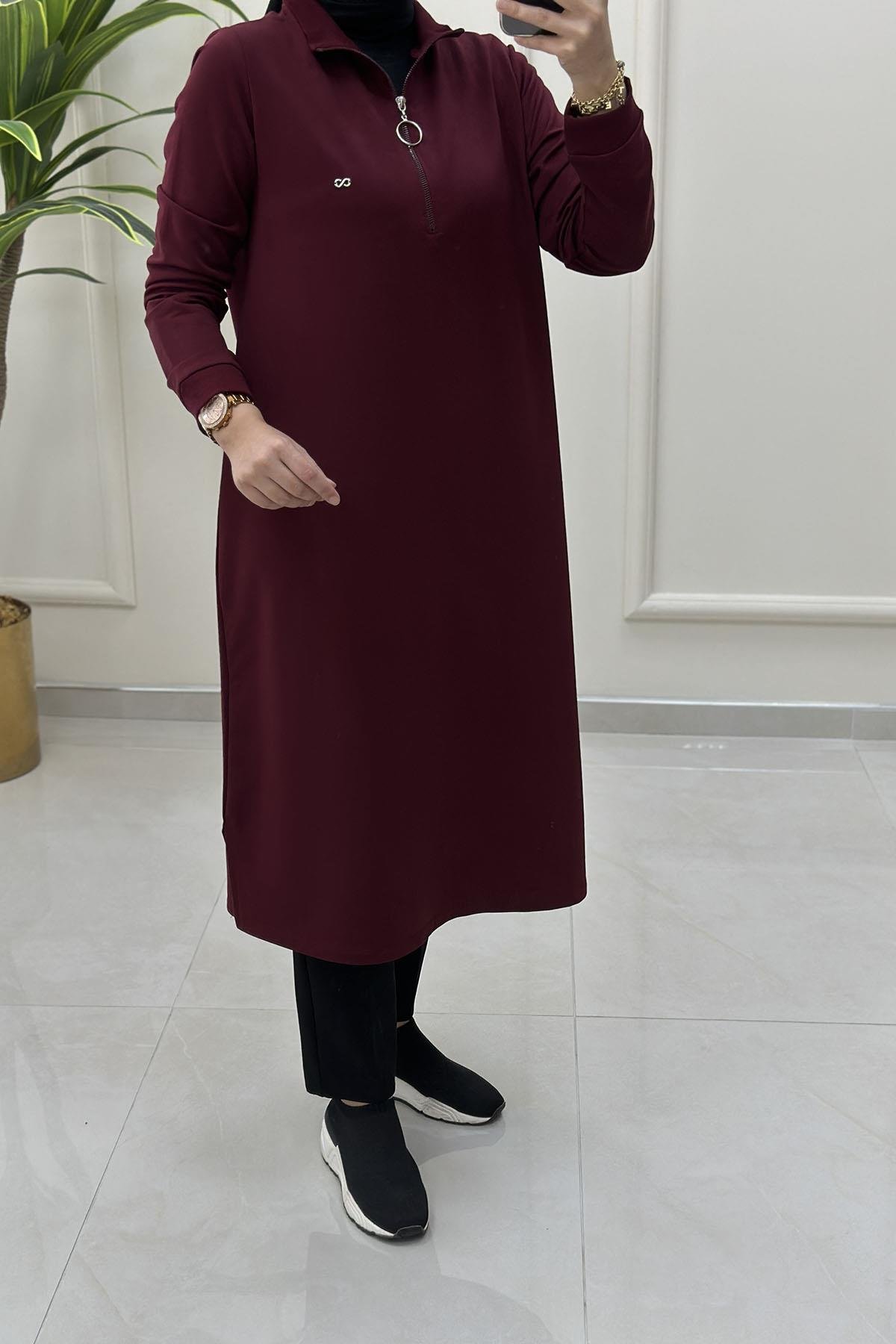 Tesettür Tunik ModelleriÖnü Yarım Fermuarlı Ribana Detaylı Kadın Tunik Bordo KADO 257322
