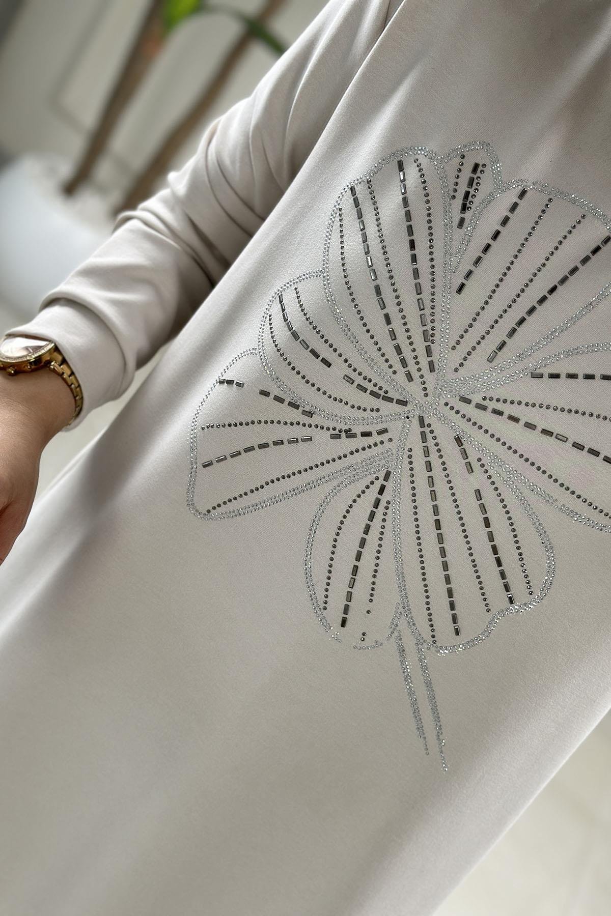 Tesettür Tunik ModelleriOysho Önü Taş Baskı Detaylı Kadın Tunik Taş KADO 257444