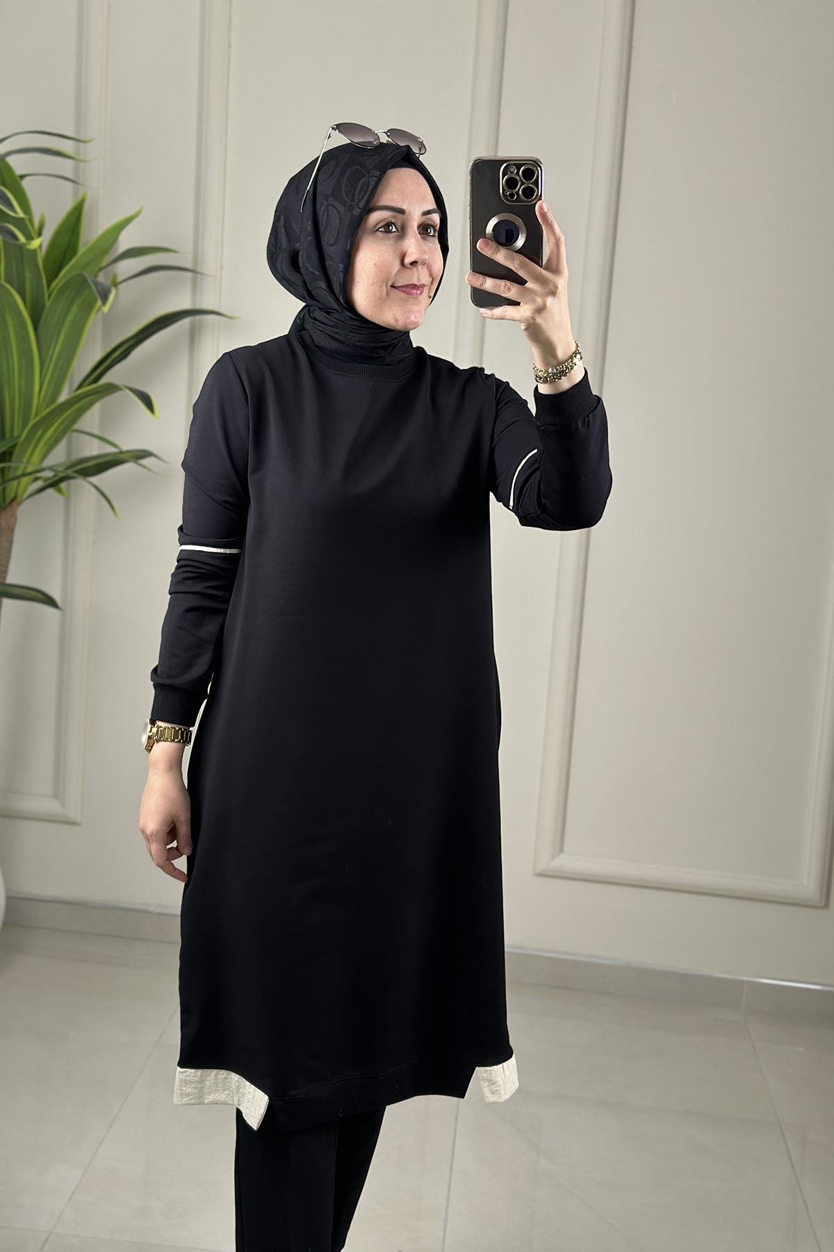 Tesettür Tunik ModelleriRibanalı Kolu Biye Detaylı Cepli Uzun Kadın Tunik Siyah KADO 262376