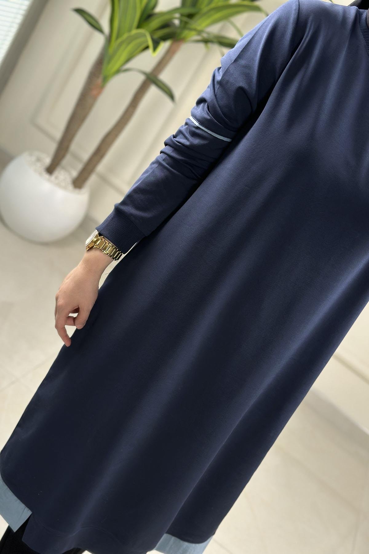 Tesettür Tunik ModelleriRibanalı Kolu Biye Detaylı Cepli Uzun Kadın Tunik Lacivert KADO 262376