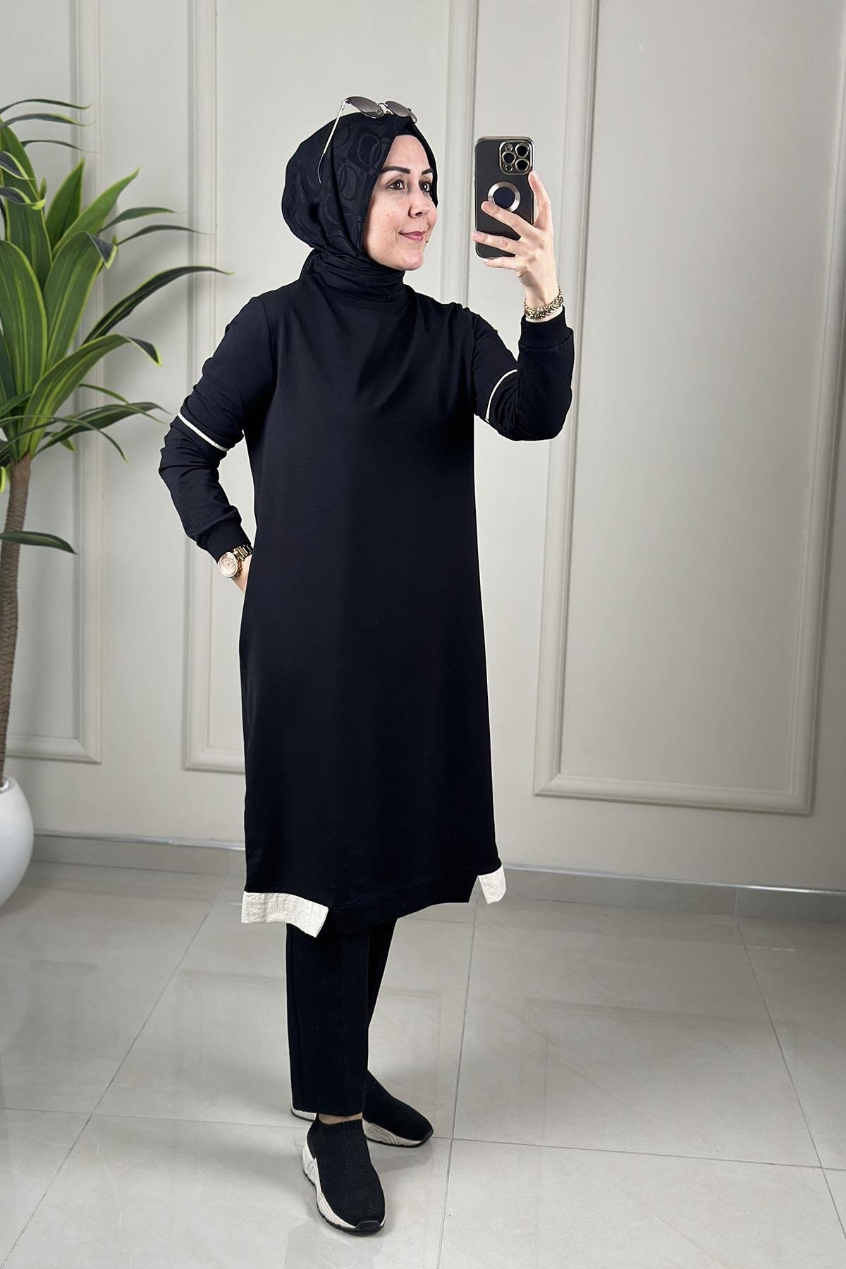 Tesettür Tunik ModelleriRibanalı Kolu Biye Detaylı Cepli Uzun Kadın Tunik Siyah KADO 262376