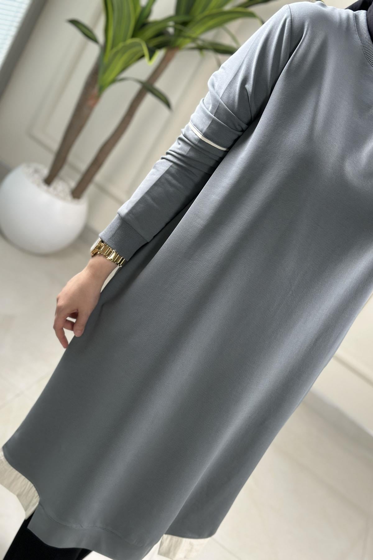 Tesettür Tunik ModelleriRibanalı Kolu Biye Detaylı Cepli Uzun Kadın Tunik Mint Yeşili KADO 262376