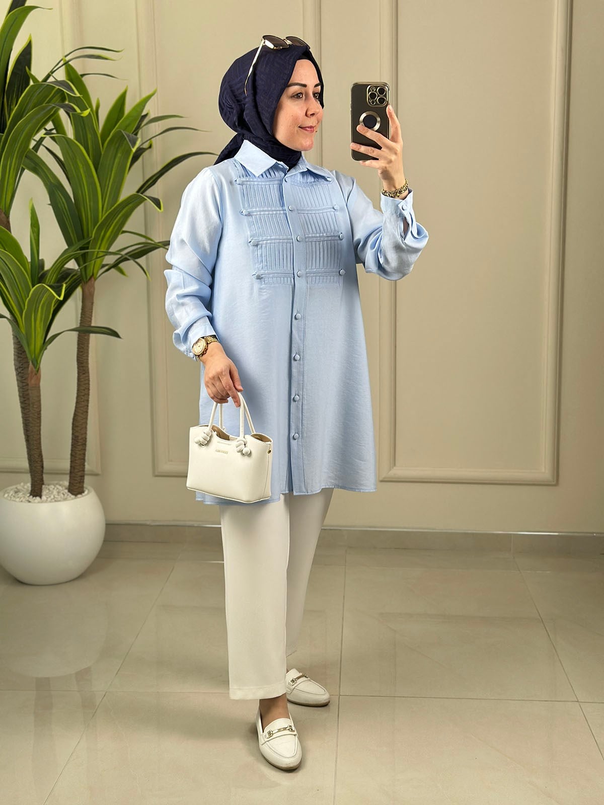 Tesettür Tunik ModelleriTensel Önü Nervürlü Düğme Detaylı Kadın Tunik Mavi EYL 2182