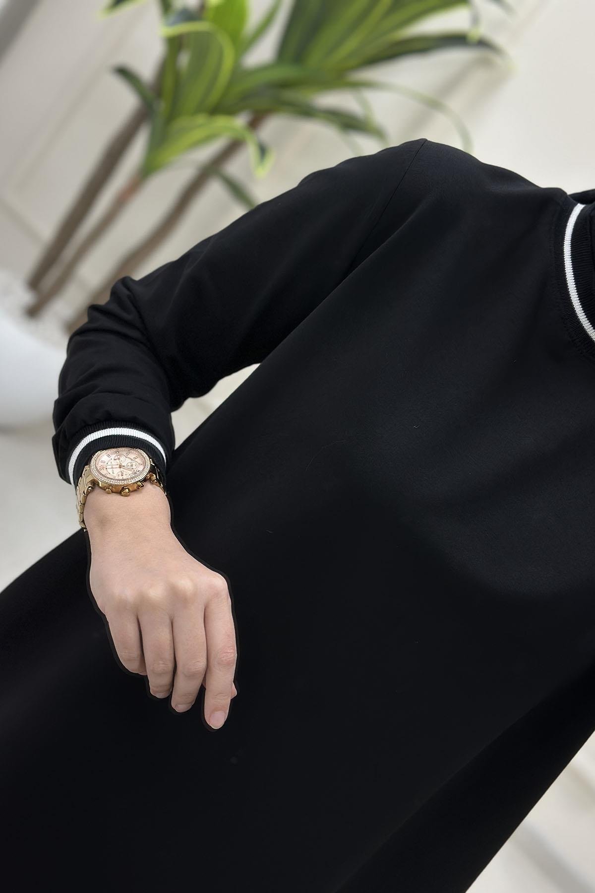 Tesettür Tunik ModelleriYaka ve Kol Ribanalı Basic Kadın Tunik Siyah KADO 257580