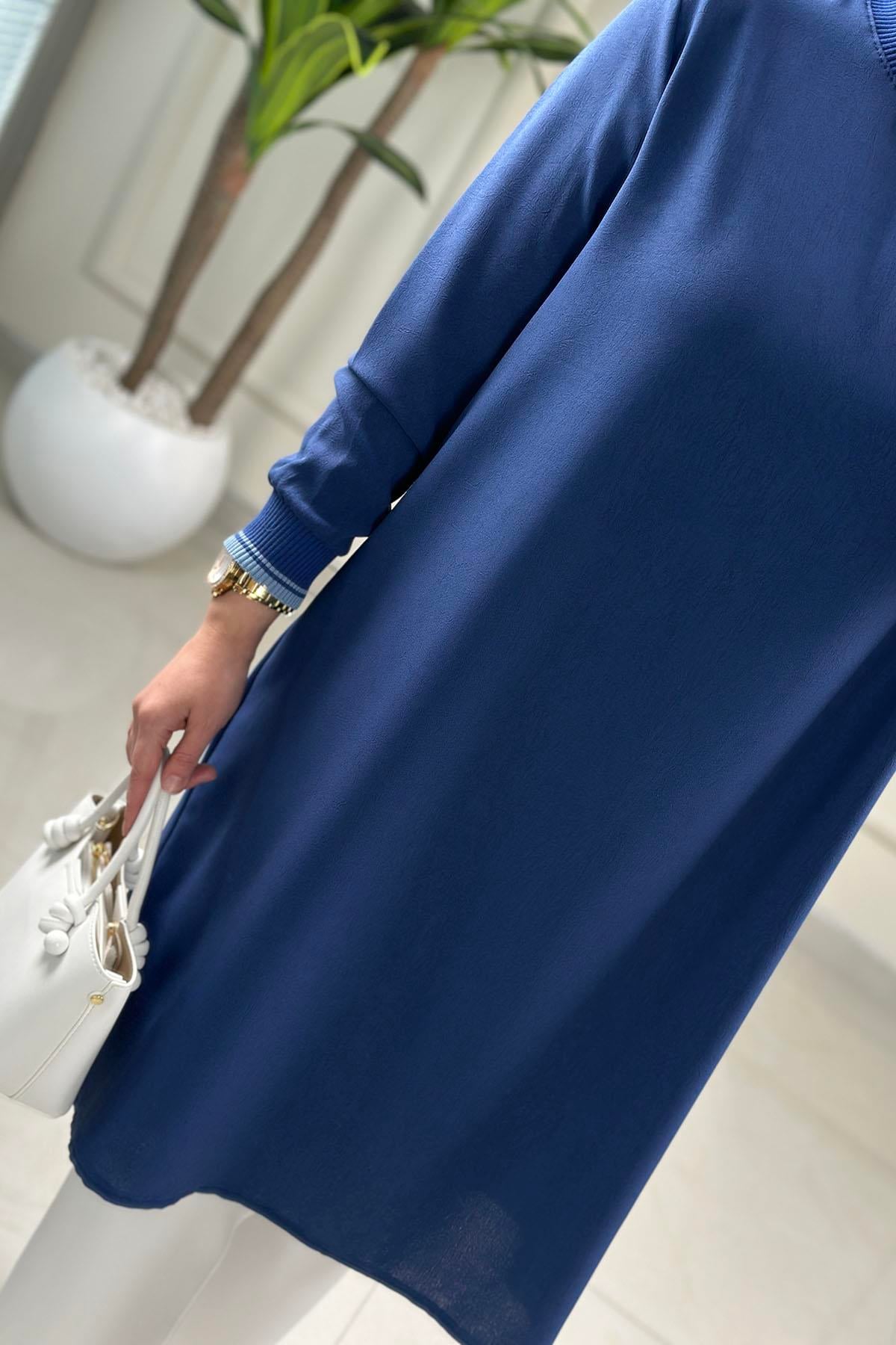 Tesettür Tunik ModelleriYaka ve Kol Ribanalı Renk Garnili Kadın Tunik Mavi KADO 262642