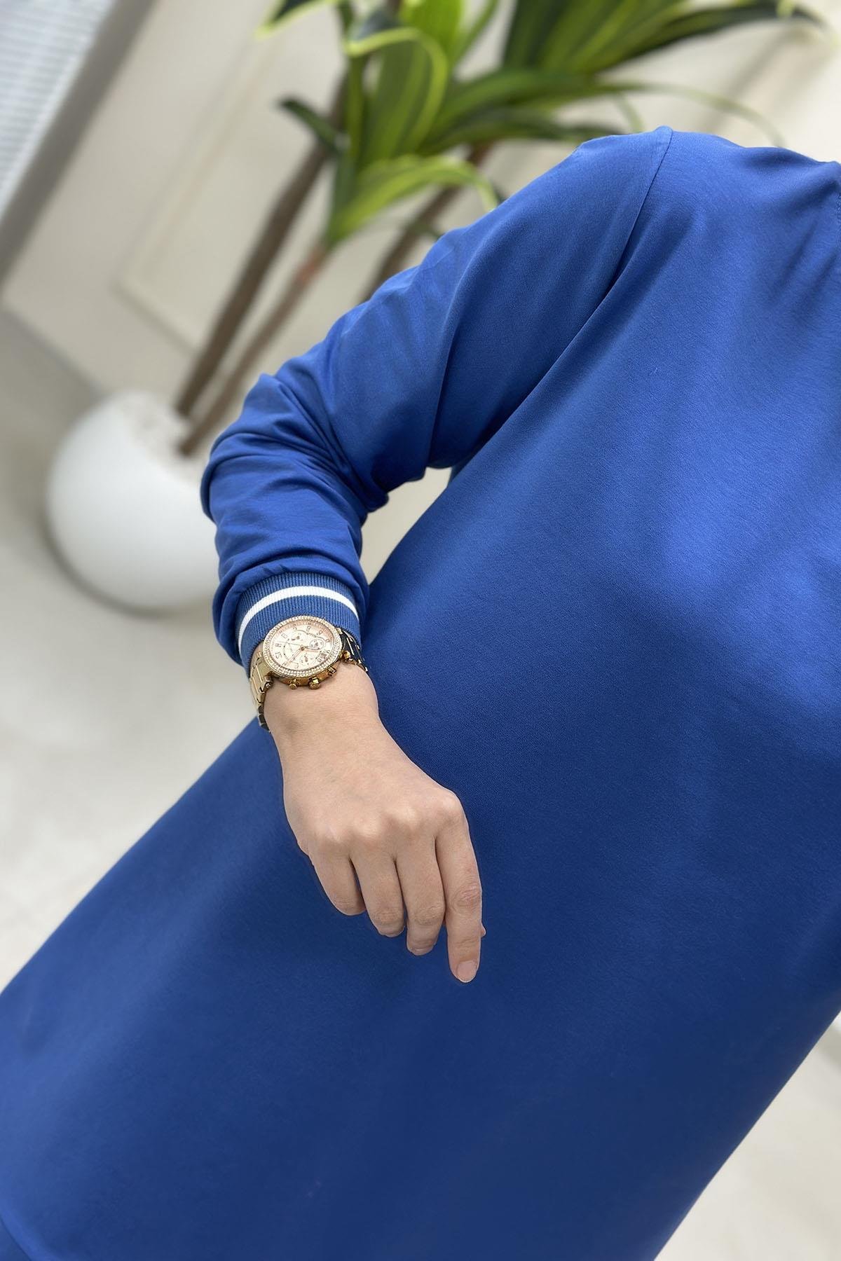 Tesettür Tunik ModelleriYaka ve Kol Ribanalı Basic Kadın Tunik Mavi KADO 257580