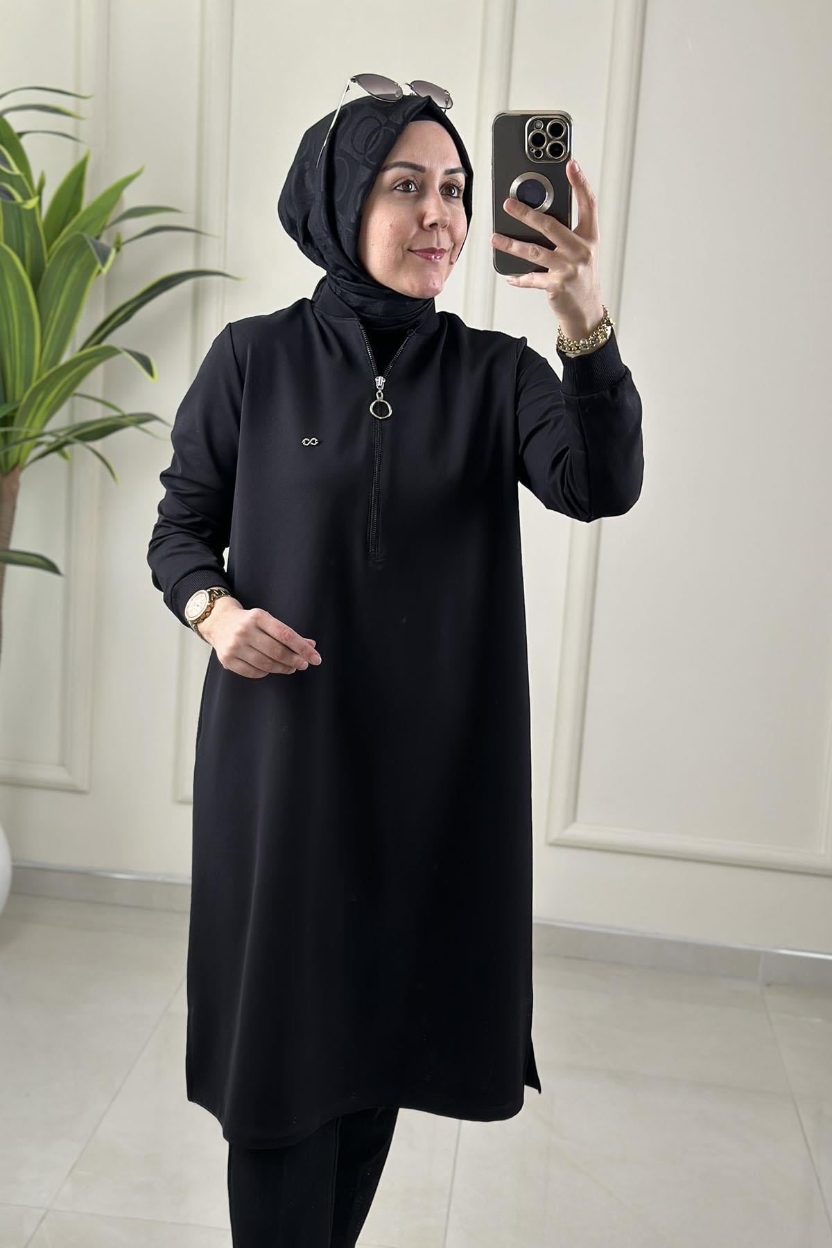 Tesettür Tunik ModelleriYaka ve Kol Ribanalı Önü Fermuarlı Kadın Tunik Siyah KADO 262630