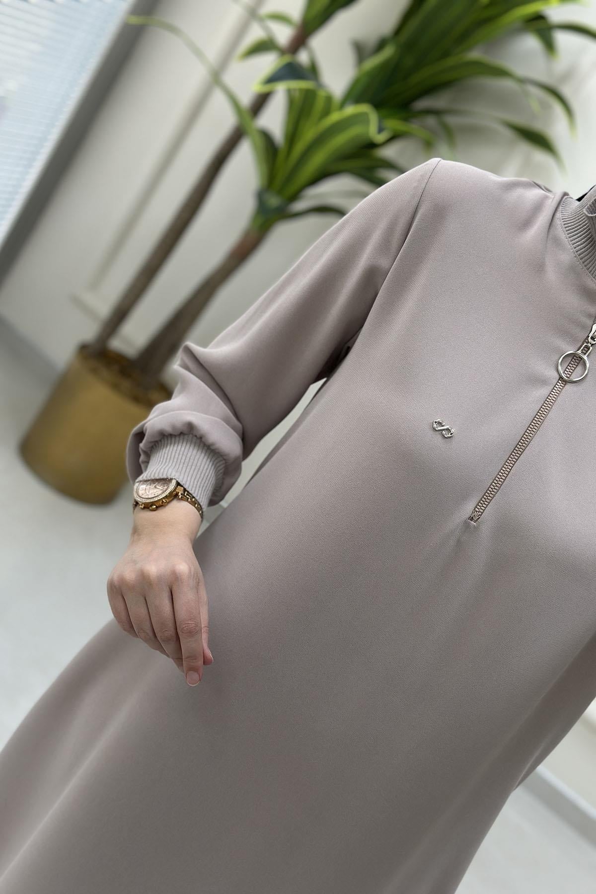 Tesettür Tunik ModelleriYaka ve Kol Ribanalı Yarım Fermuarlı Kadın Tunik Taş KADO 251591