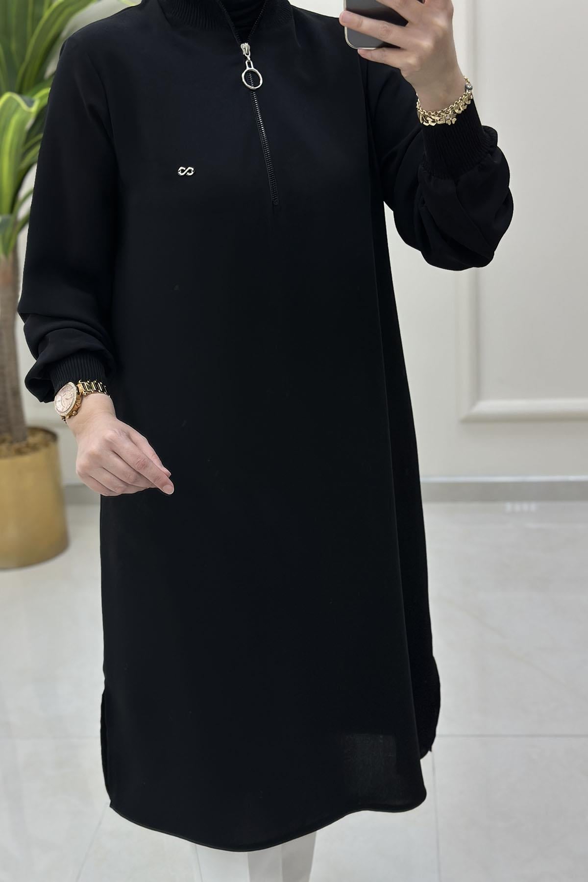 Tesettür Tunik ModelleriYaka ve Kol Ribanalı Yarım Fermuarlı Kadın Tunik Siyah KADO 251591