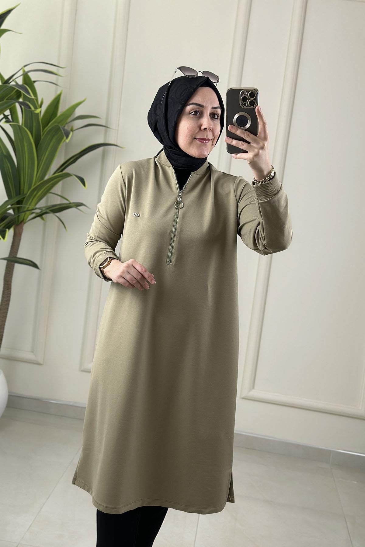 Tesettür Tunik ModelleriYaka ve Kol Ribanalı Önü Fermuarlı Kadın Tunik Açık Yeşil KADO 262630