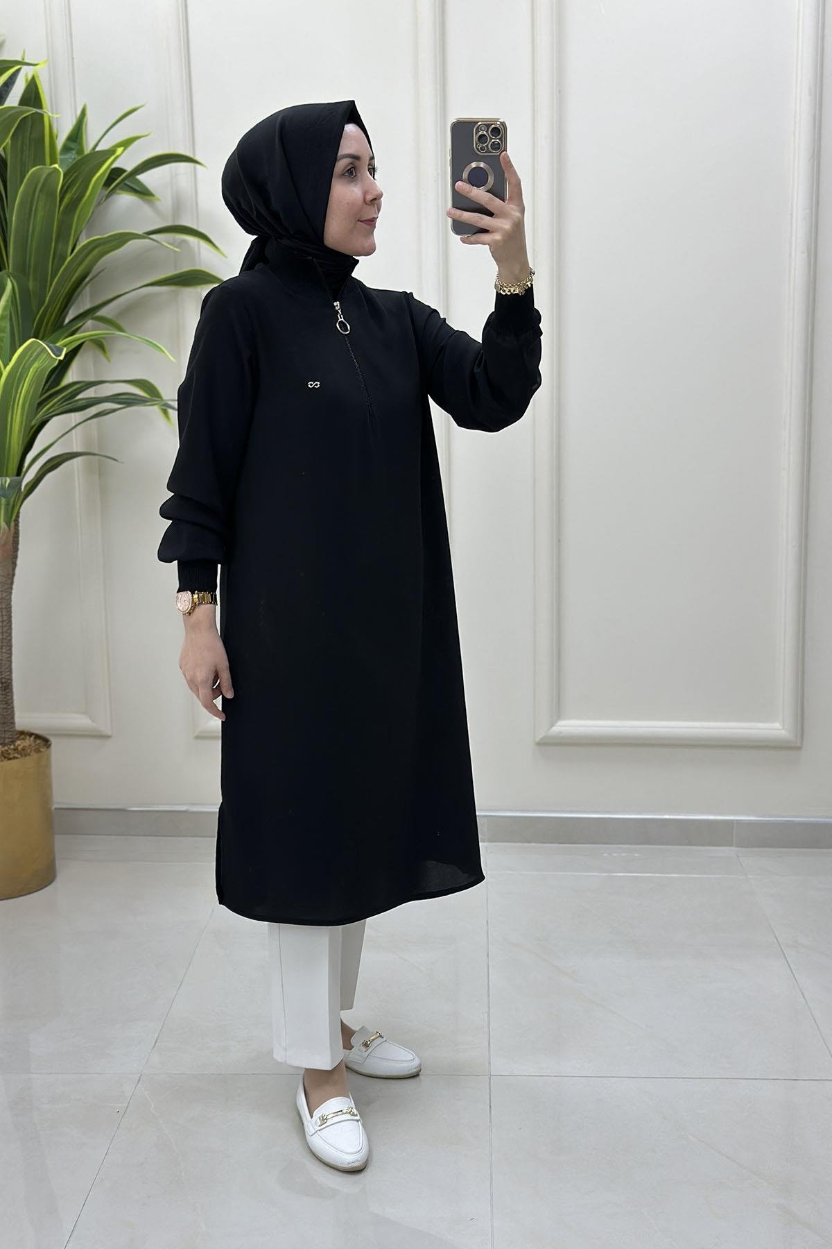 Tesettür Tunik ModelleriYaka ve Kol Ribanalı Yarım Fermuarlı Kadın Tunik Siyah KADO 251591