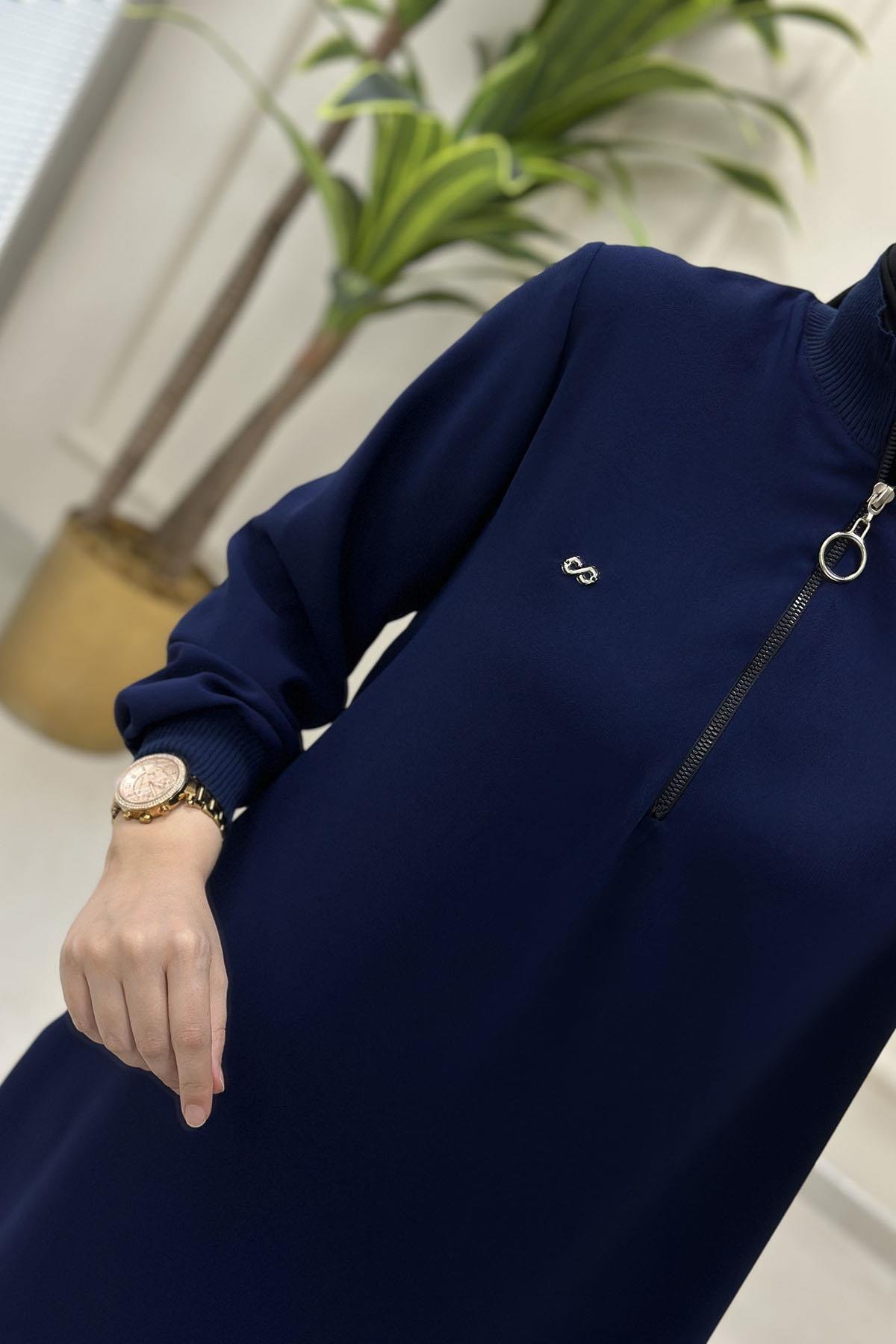 Tesettür Tunik ModelleriYaka ve Kol Ribanalı Yarım Fermuarlı Kadın Tunik Lacivert KADO 251591