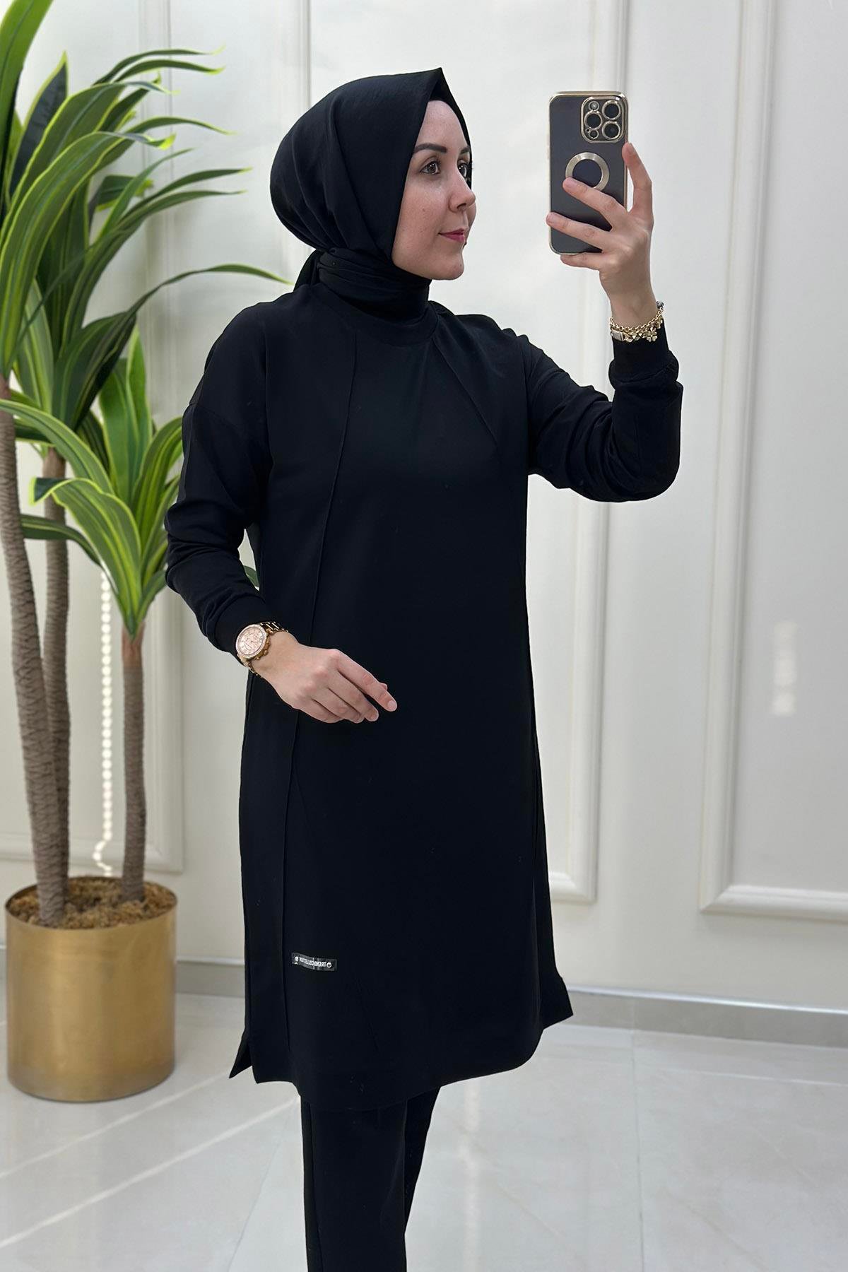 Tesettür TunikDüşük Omuz Önü Nervürlü Ribanalı Kadın Tunik Siyah KADO 9236 