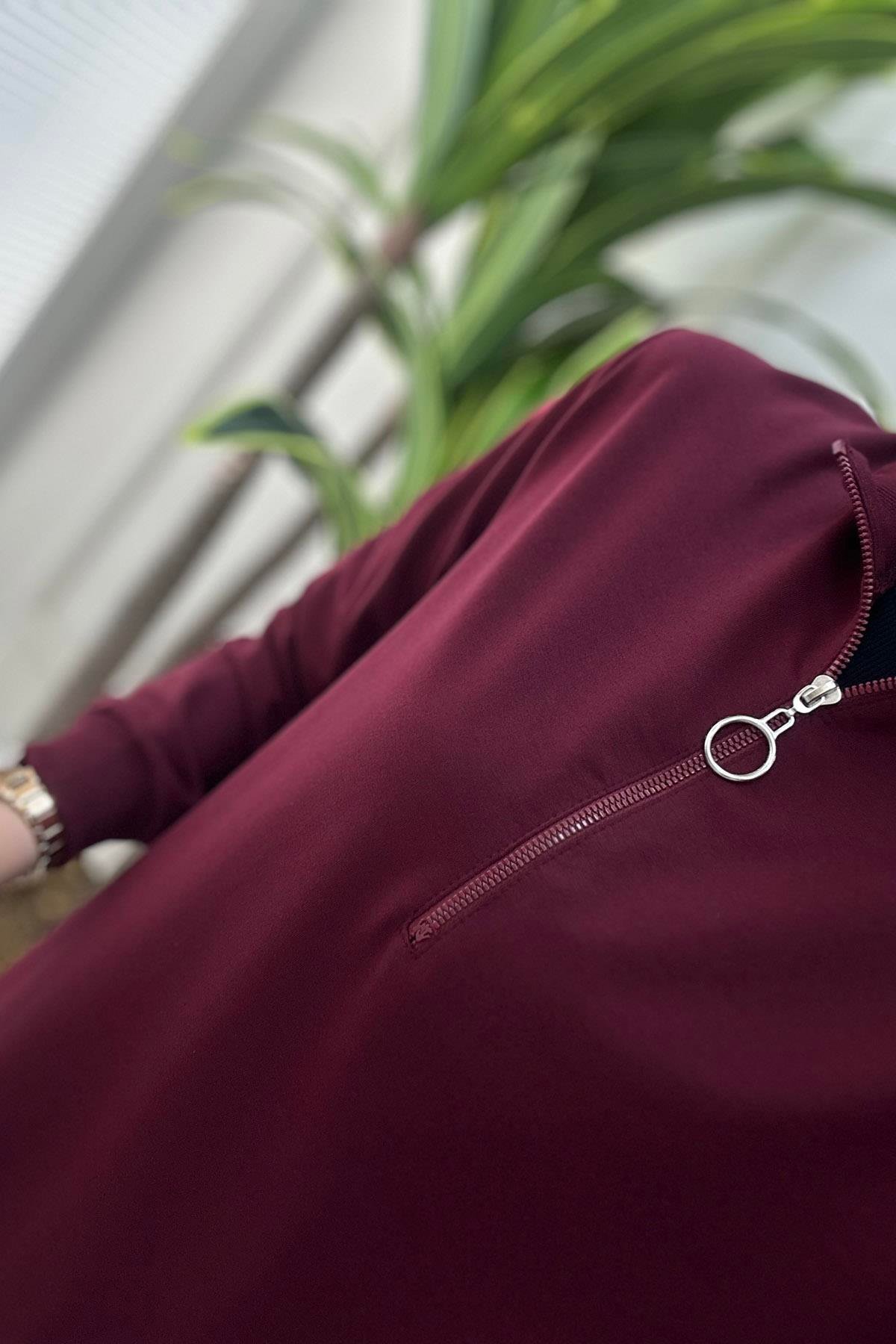 Tesettür TunikKol ve Yaka Ribanalı Önü Yarım Fermuarlı Kadın Tunik Bordo KADO 7568