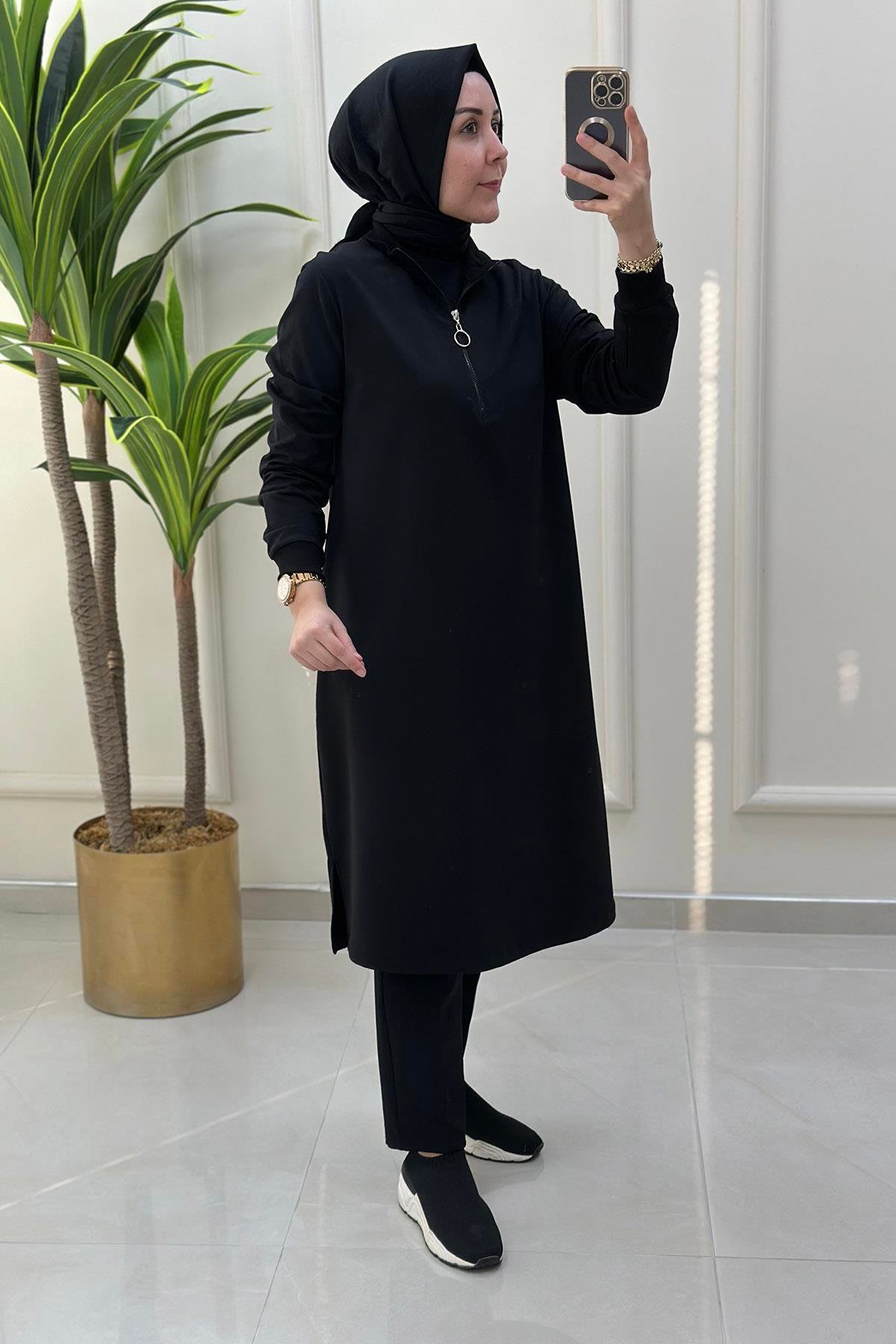 Tesettür TunikKol ve Yaka Ribanalı Önü Yarım Fermuarlı Kadın Tunik Siyah KADO 7568