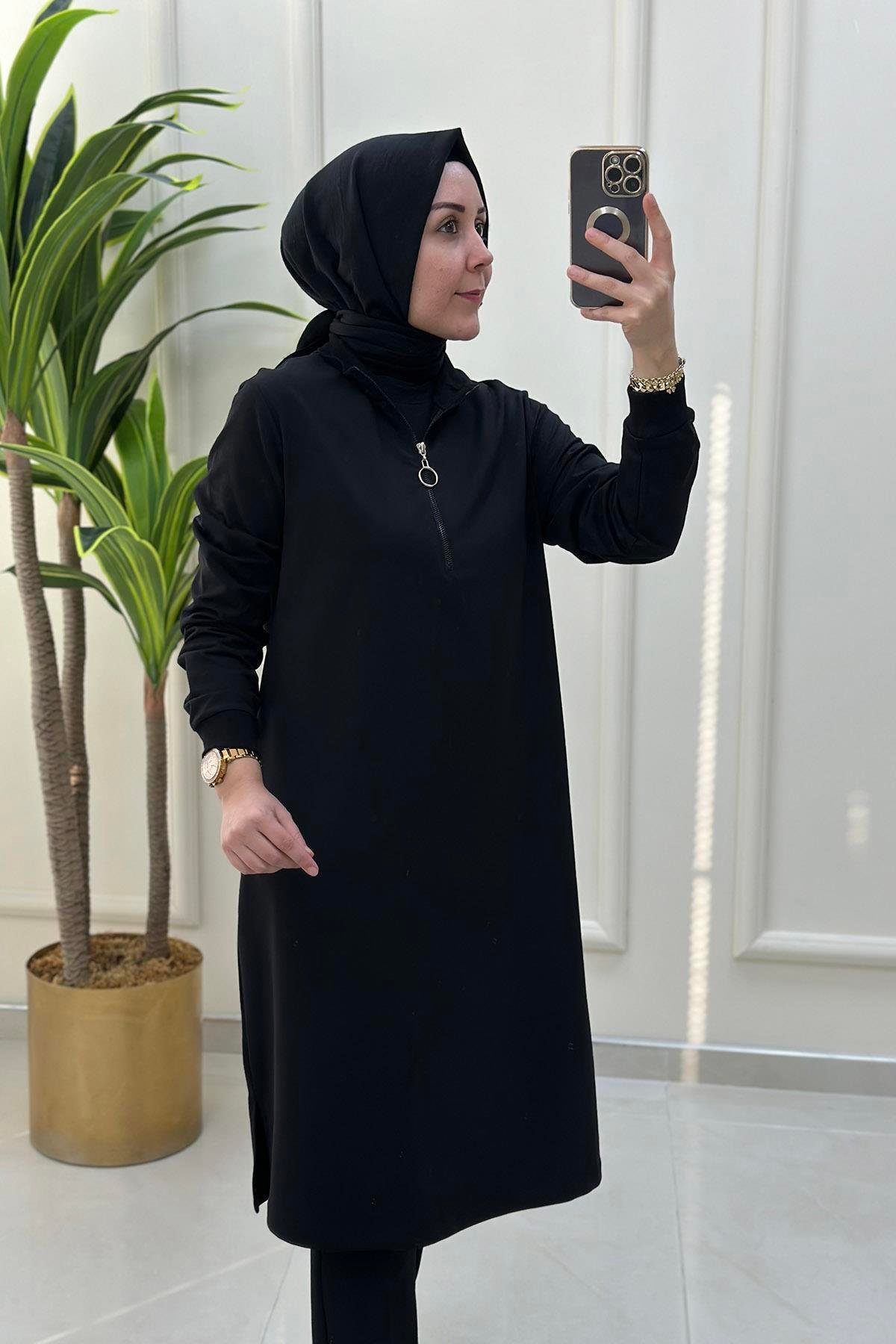 Tesettür TunikKol ve Yaka Ribanalı Önü Yarım Fermuarlı Kadın Tunik Siyah KADO 7568