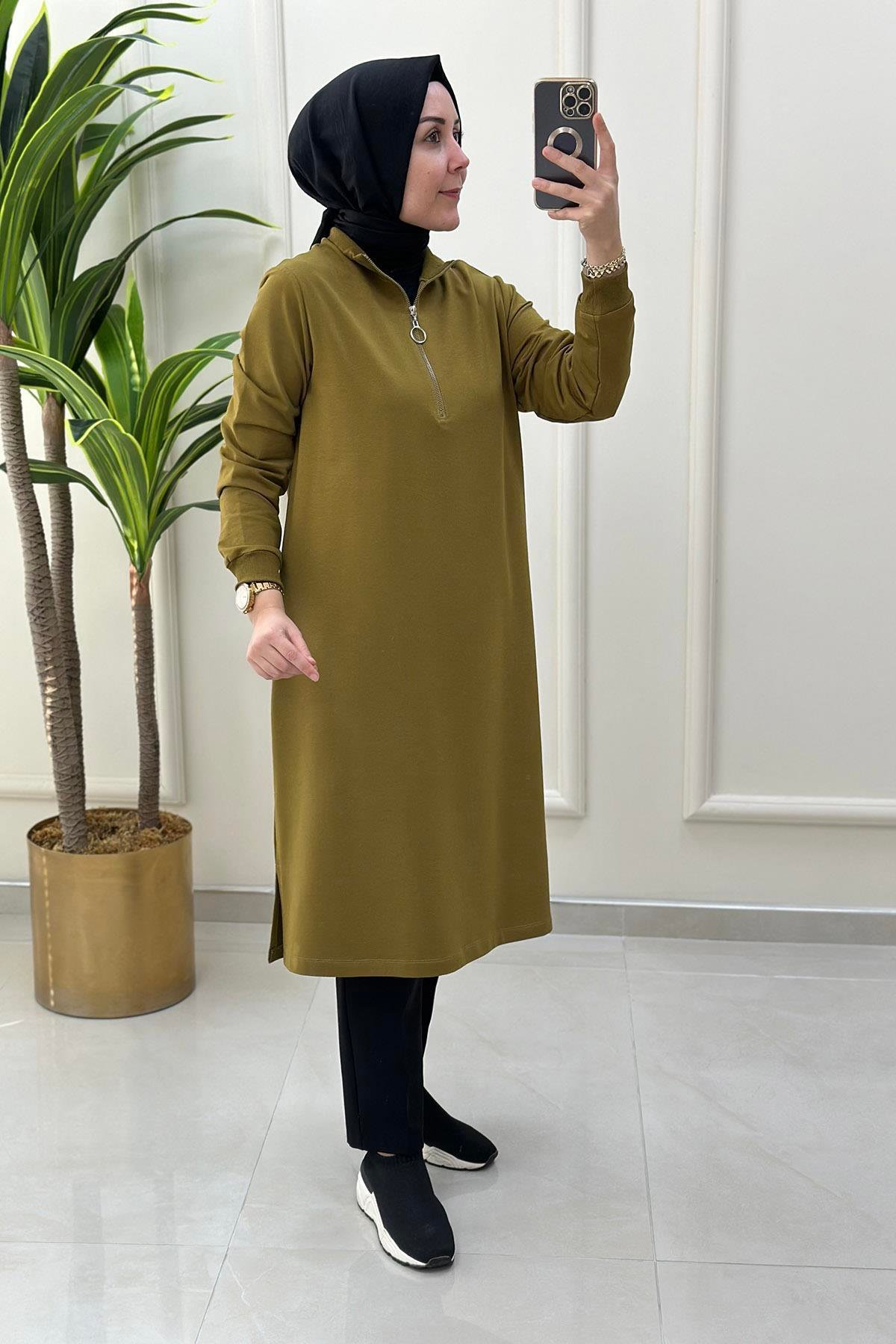 Tesettür TunikKol ve Yaka Ribanalı Önü Yarım Fermuarlı Kadın Tunik Yağ Yeşili KADO 7568