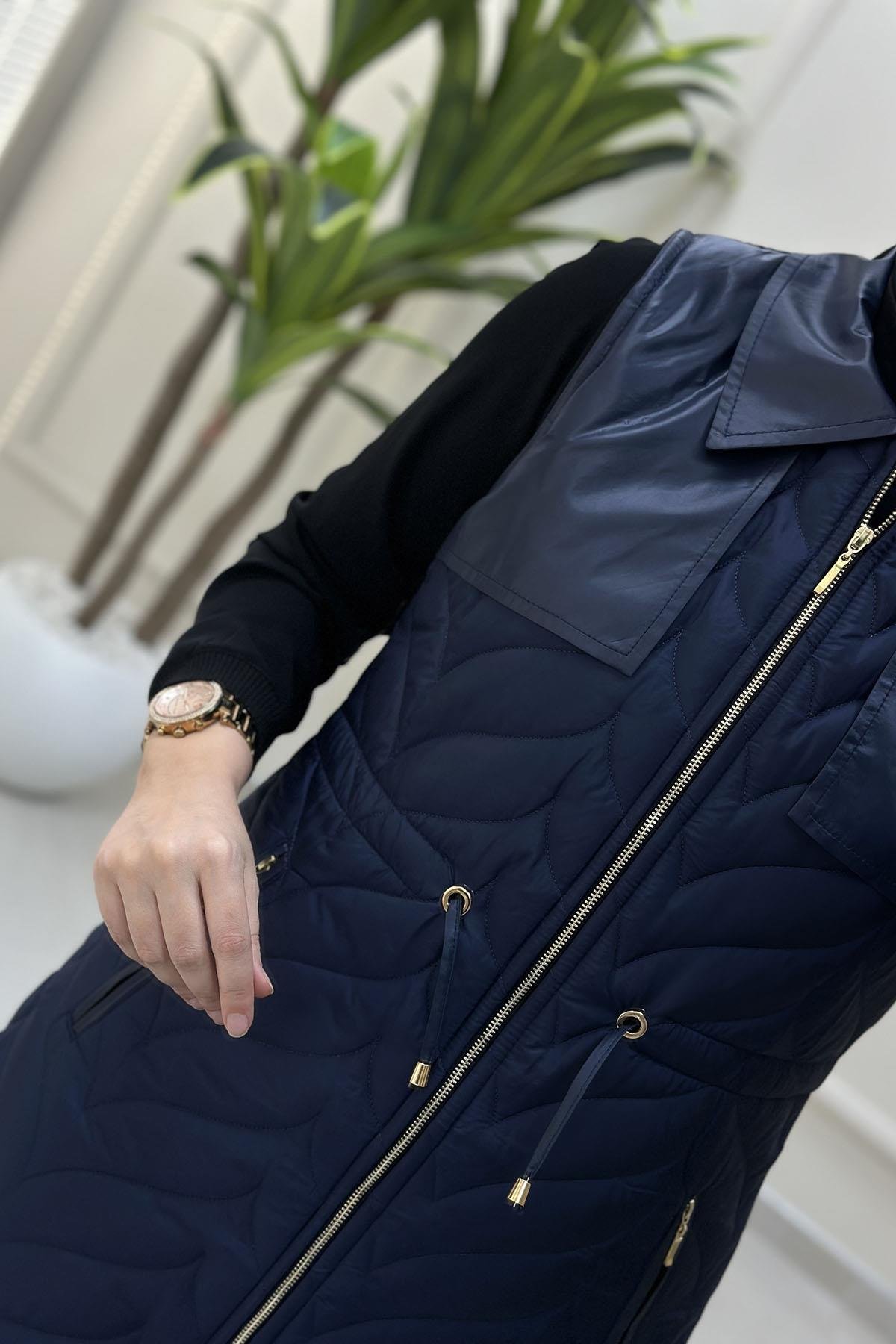 Tesettür YelekKapitone Dolum Önü Fermuarlı Beli Büzgülü Kadın Yelek Lacivert QTN 4965