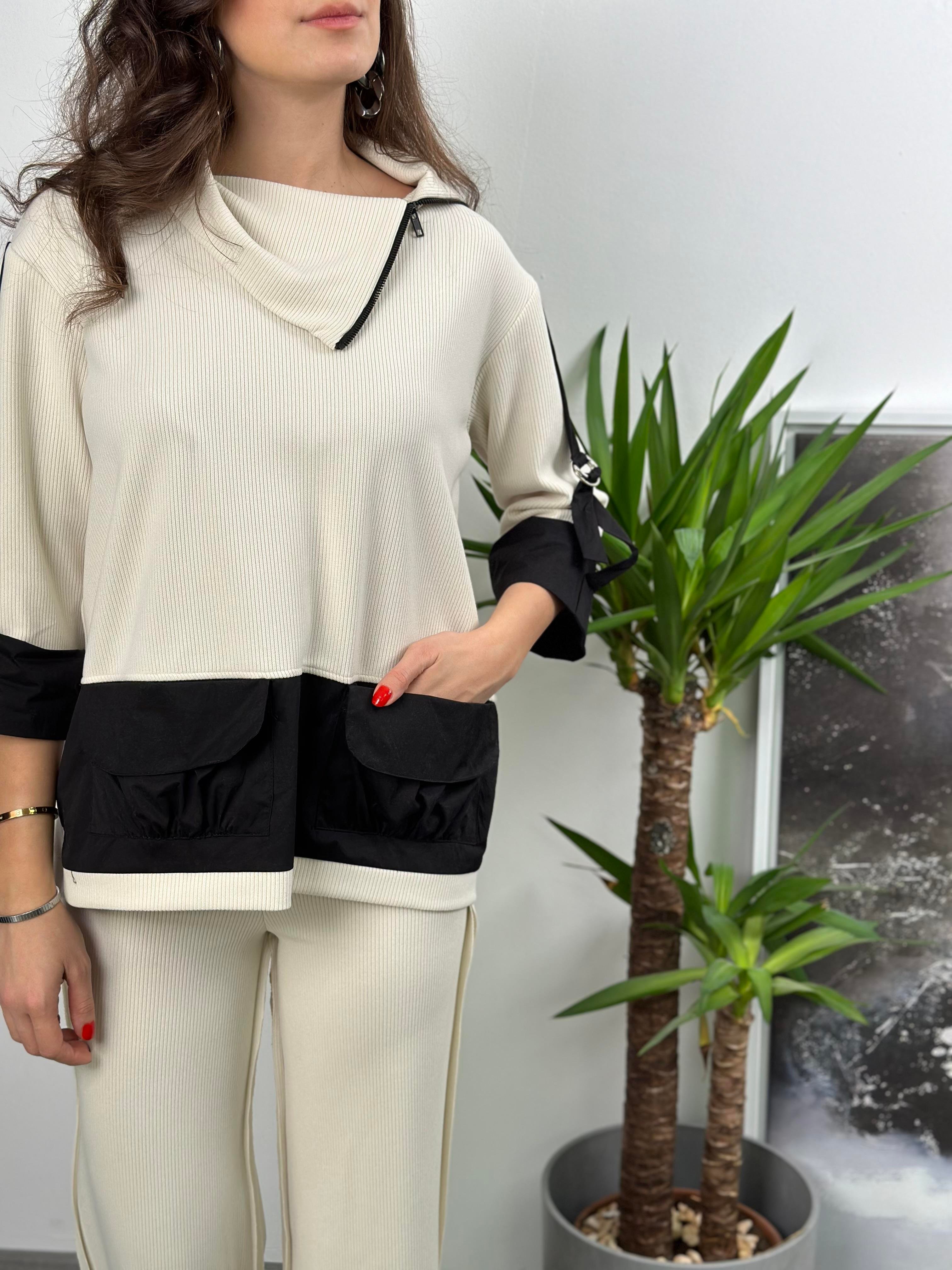 BALİ KREM CEP DETAYLI TRİKO BLUZ