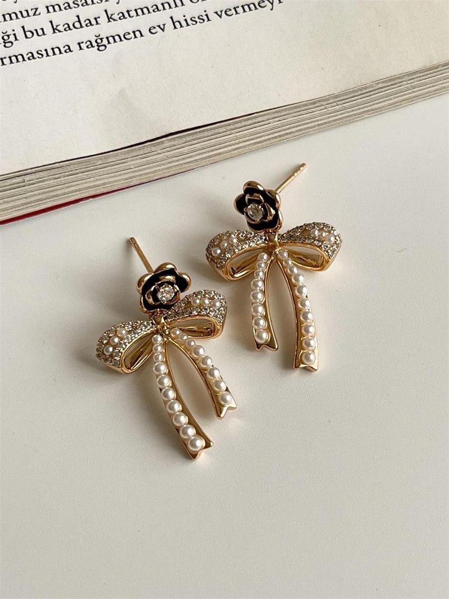 Özel Kaplama Xuping Siyah Gül İncili Fiyonk Küpe (2.5 Cm)