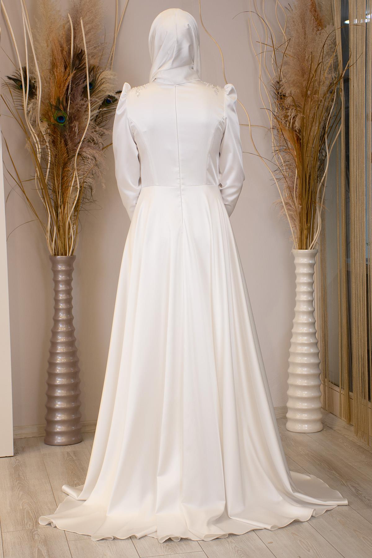 Kuyruklu Aplik İşlemeli Hakim Yaka Damla Tesettür Abiye - Ekru