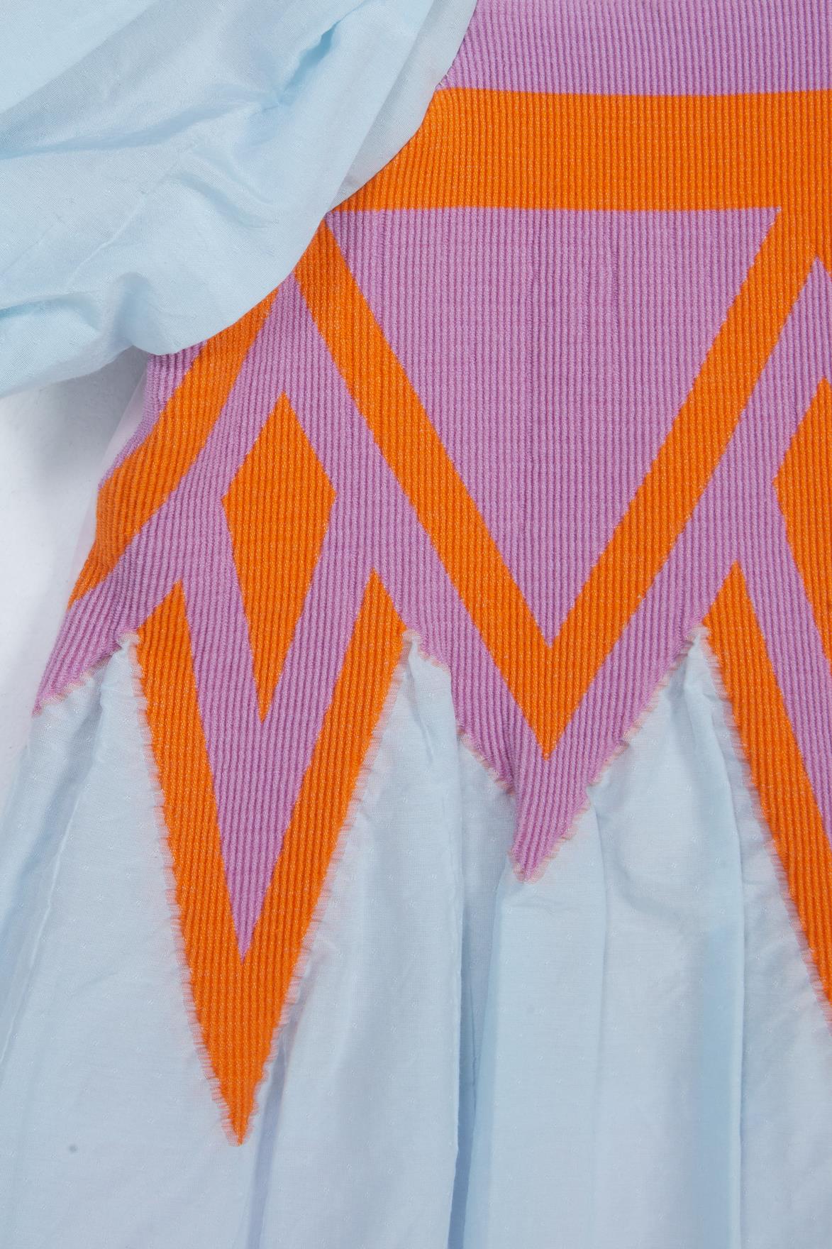 Desenli Etek Ucu Asimetrik Kolları Pileli Pembe Elbise