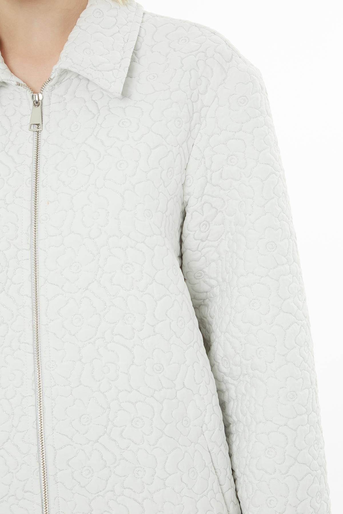 White Jacket with Embossed Pattern and Zipper