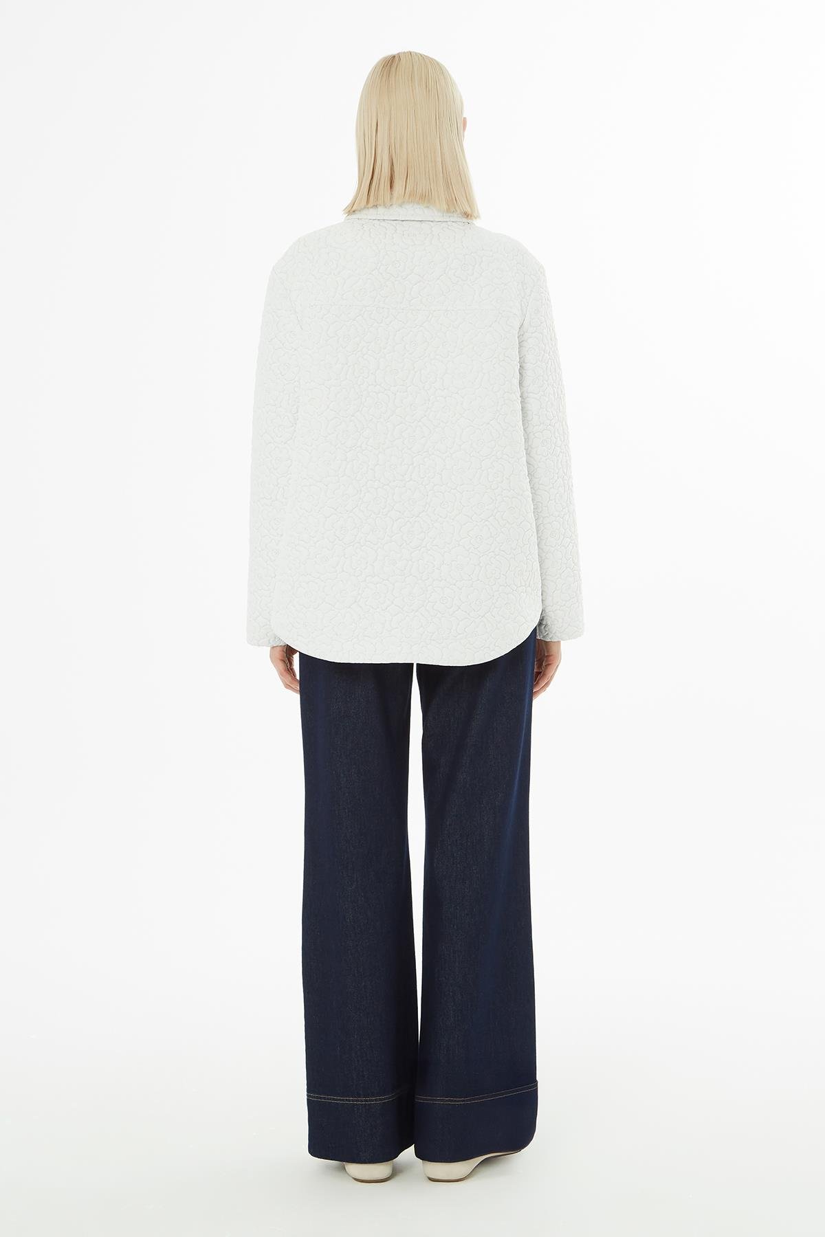 White Jacket with Embossed Pattern and Zipper