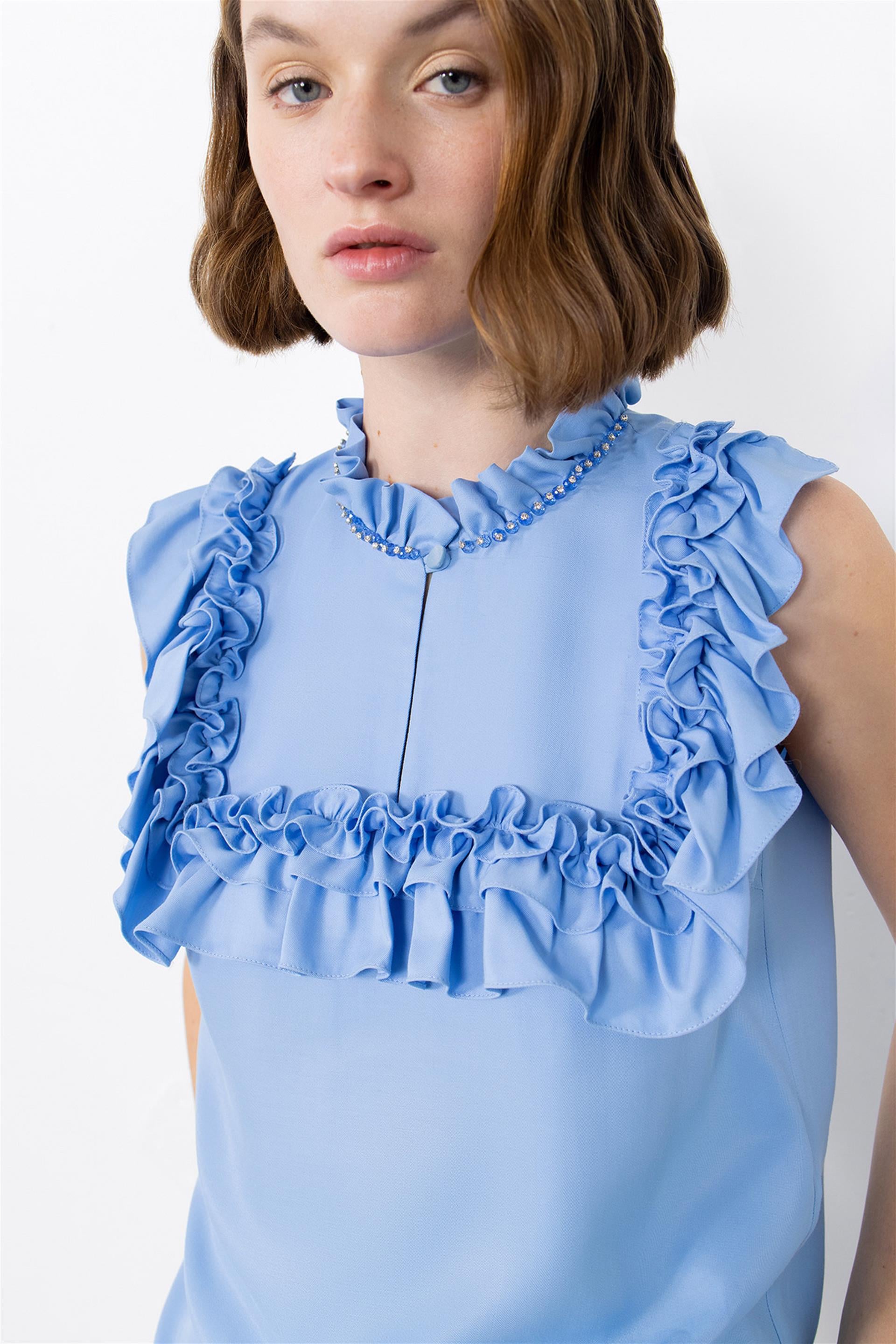 Blue Blouse With Ruffled Embroidery Detail