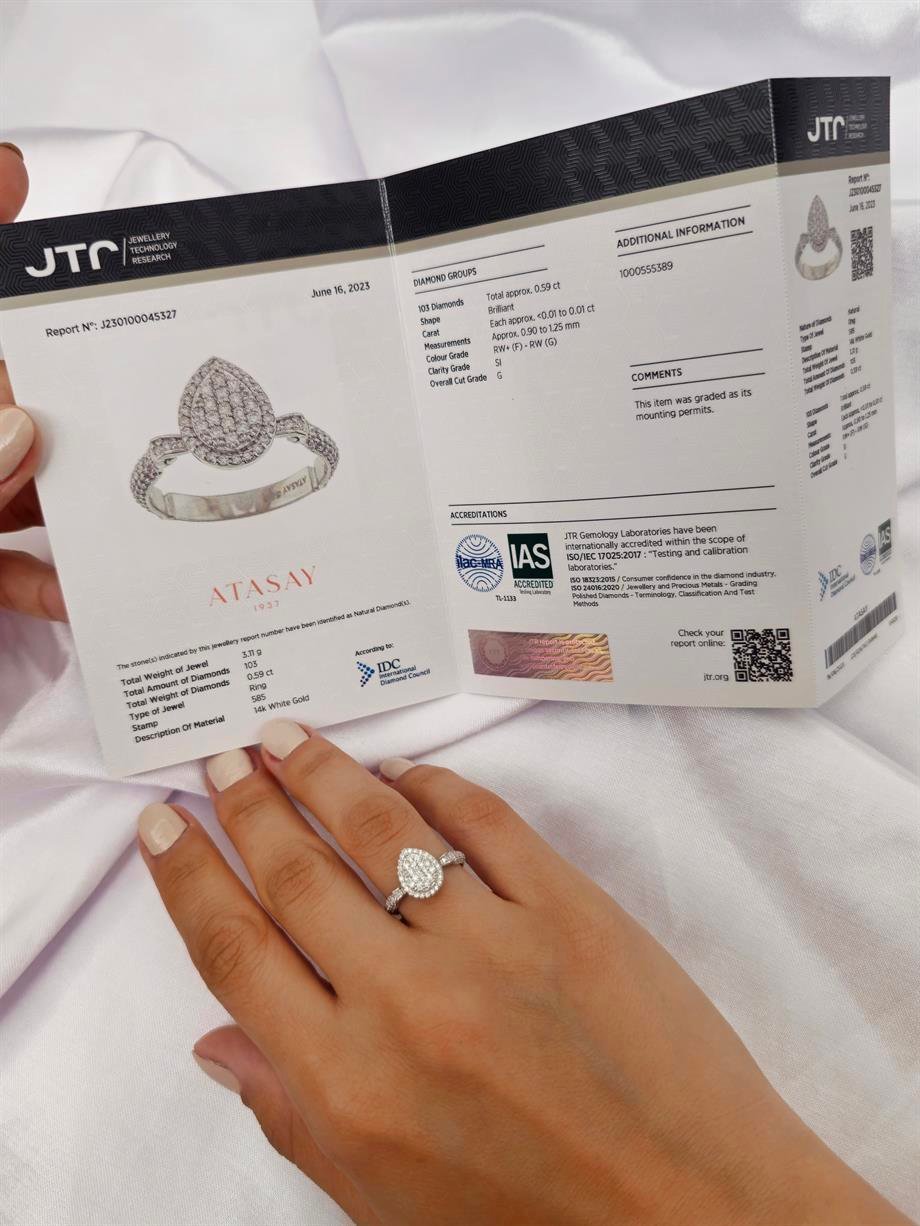 0,59 CT SARAY İŞLEMELİ DAMLA TASARIMLI BAGET PIRLANTA YÜZÜK
