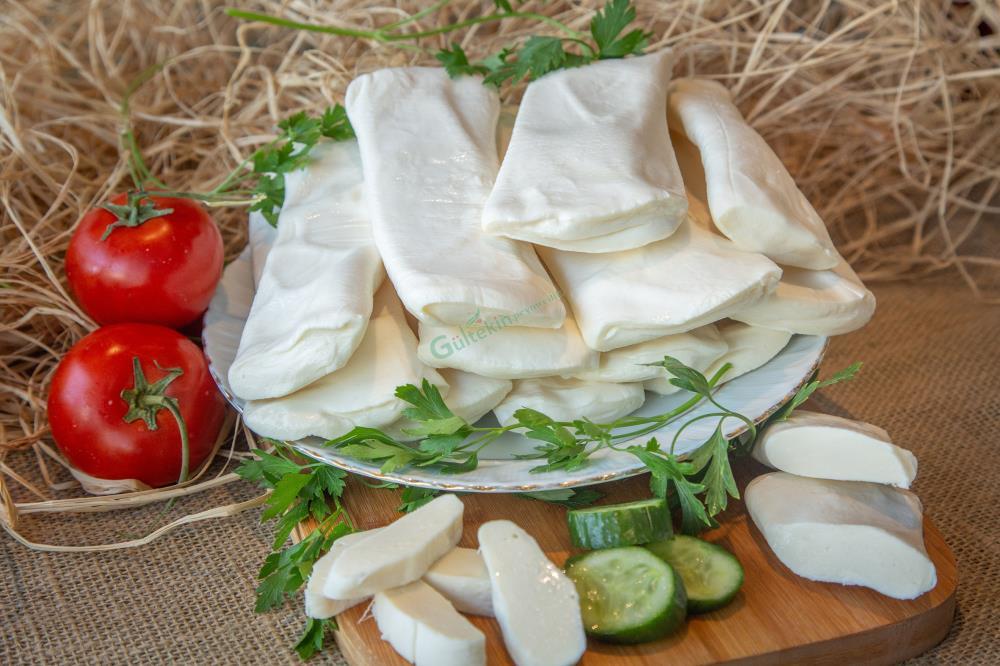 AZ TUZLU DİL PEYNİR (500 GRM )
